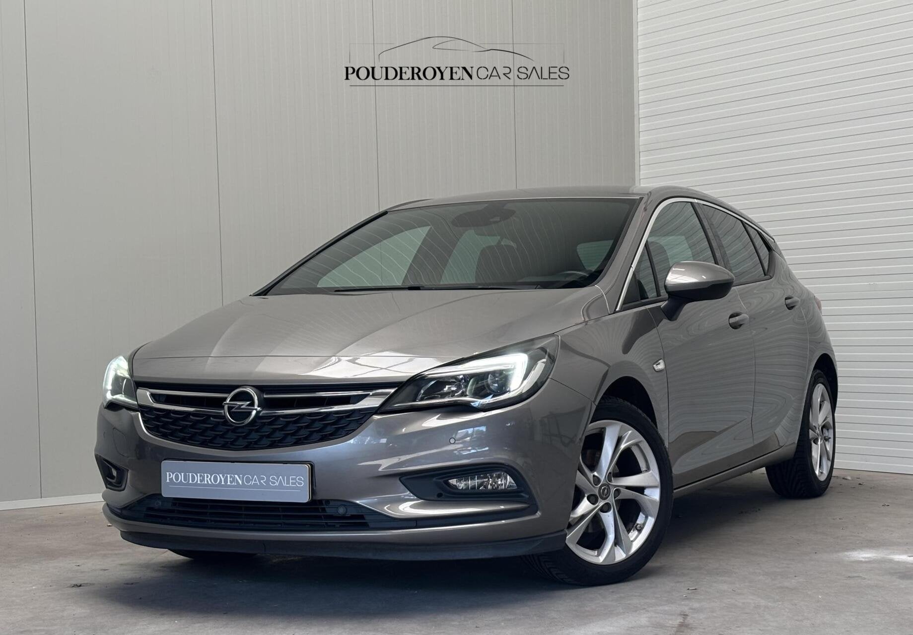 Opel Astra 1.4 Turbo S/S / Carplay / Navi / Camera / Dodehoe, Auto's, Opel, Gebruikt, Beige, Bedrijf, Handgeschakeld