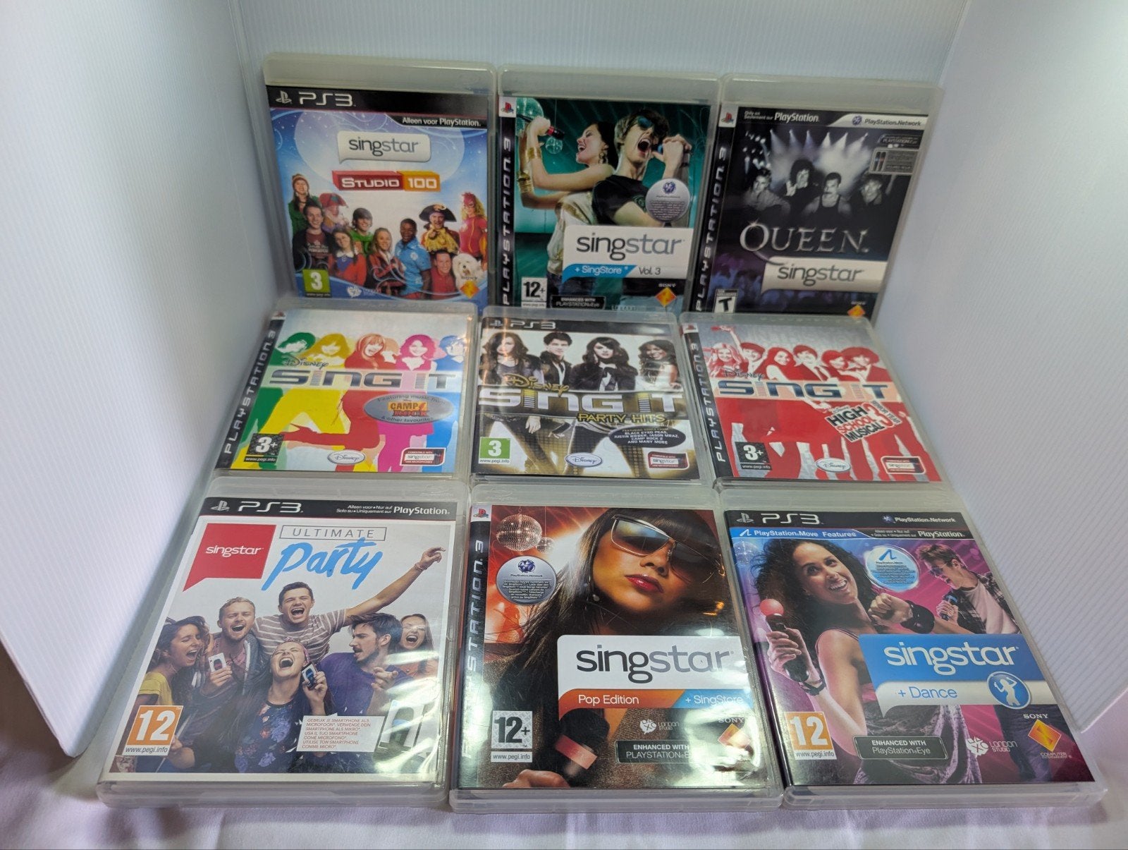 SingStar PS3 Bundel: 2 Microfoons & 9 Games, Verzenden, Gebruikt, Met 2 controllers, Met games