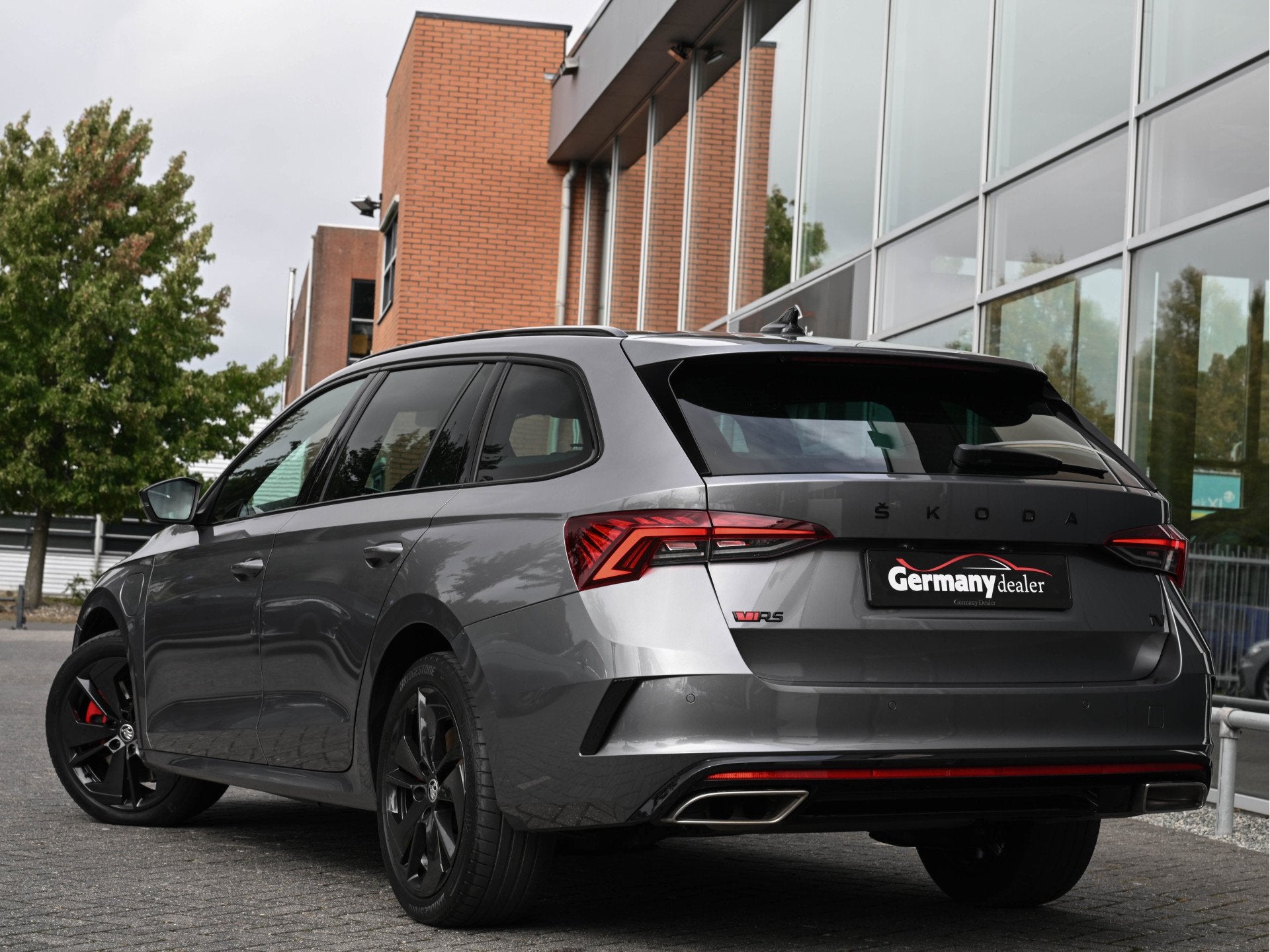 Skoda Octavia Combi 1.4 TSI 245pk RS iV PHEV Business Pano H, Auto's, Gebruikt, Zwart, 4 cilinders, Met garantie (alle)