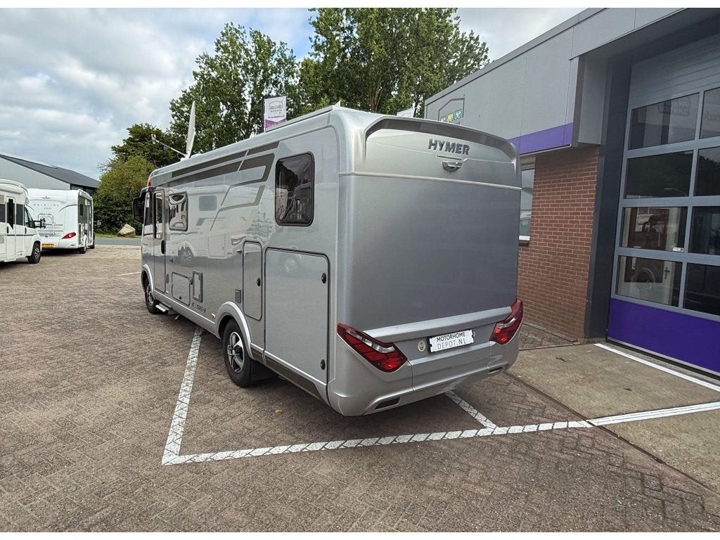 Hymer Exsis-I 588 LEVEL Lengtebedden Hefbed Full Options!, Caravans en Kamperen, Campers, Integraal, Fiat, 6 tot 7 meter, Bedrijf