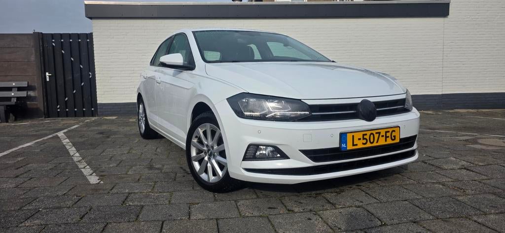 Volkswagen Polo 1.0 TSI 95pk 2021 Wit, Auto's, Voorwielaandrijving, 1063 kg, Electronic Stability Program (ESP), Origineel Nederlands