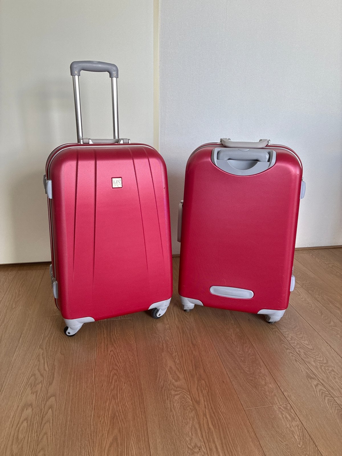 Set van 2 rode koffers met uitschuifbare handgreep, Gebruikt, 20 tot 30 cm, Ophalen of Verzenden, 60 tot 80 cm