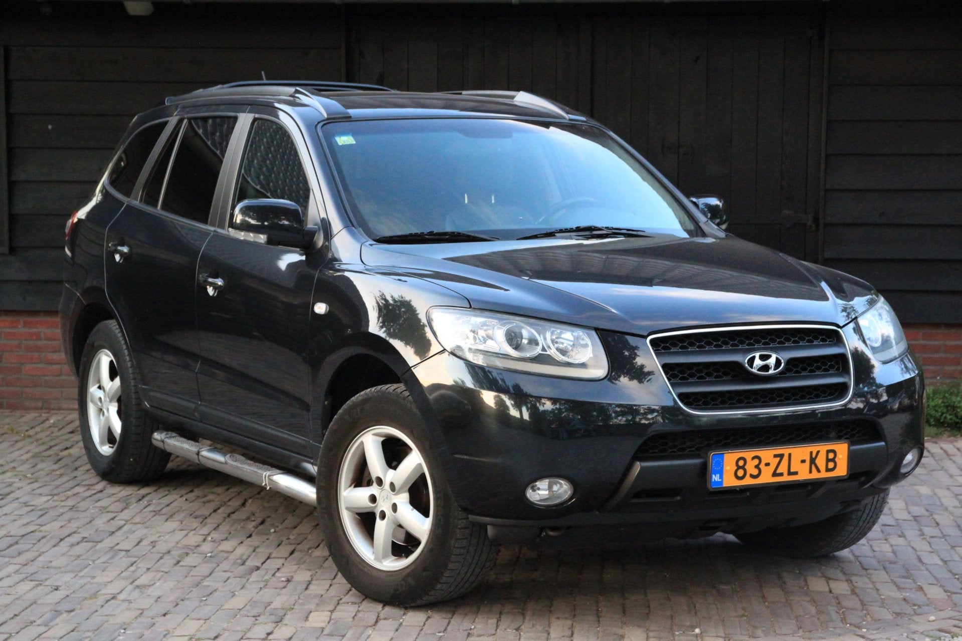 Hyundai Santa Fe 2.7i V6 4WD Business Edition Elek-Dak/Camer, Automaat, Santa Fe, Gebruikt, Zwart