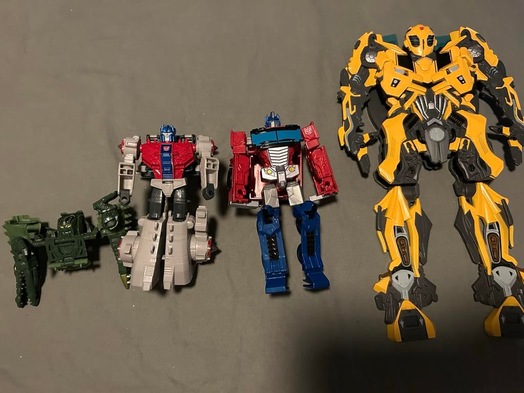 Transformers en Dinobots.  Optimusprime, Verzamelen, Transformers, Overige generaties, Ophalen of Verzenden, Gebruikt, Autobots