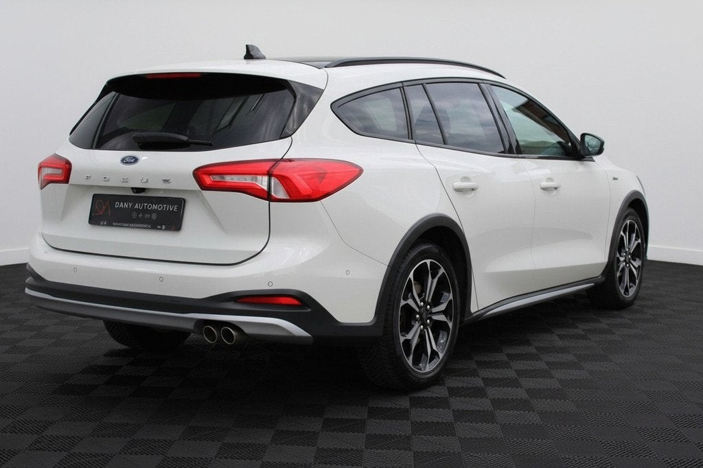 Ford Focus Wagon 1.5 EcoBoost Active PANO I KEYLESS I CARPLA, Zwart, Leder en Stof, Wit, 3 cilinders