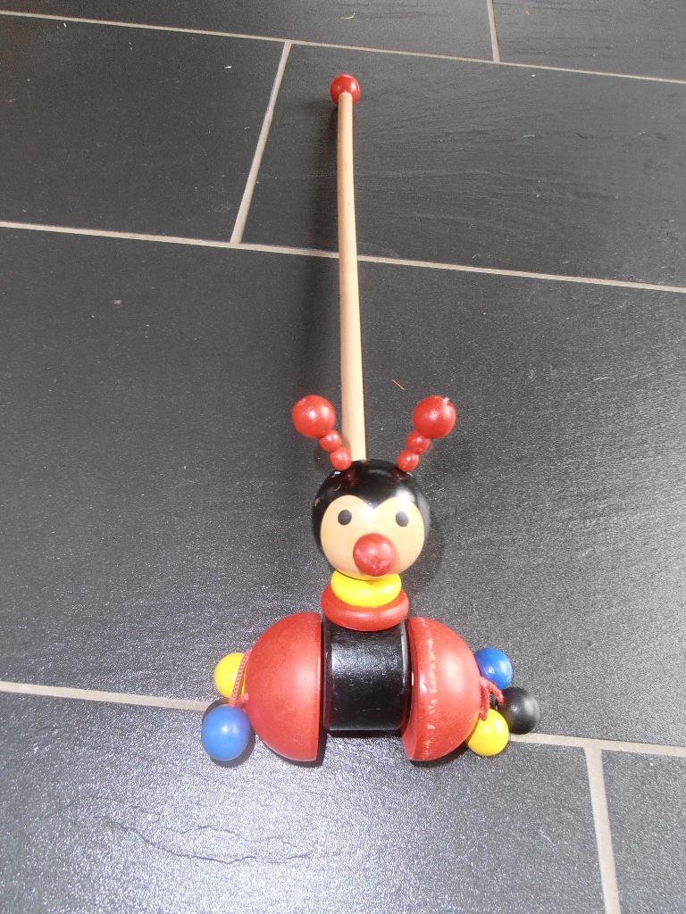 duwstok lieveheersbeestje, Kinderen en Baby's, Speelgoed | Houten speelgoed, Ophalen of Verzenden, Gebruikt, Duw- of Trekspeelgoed