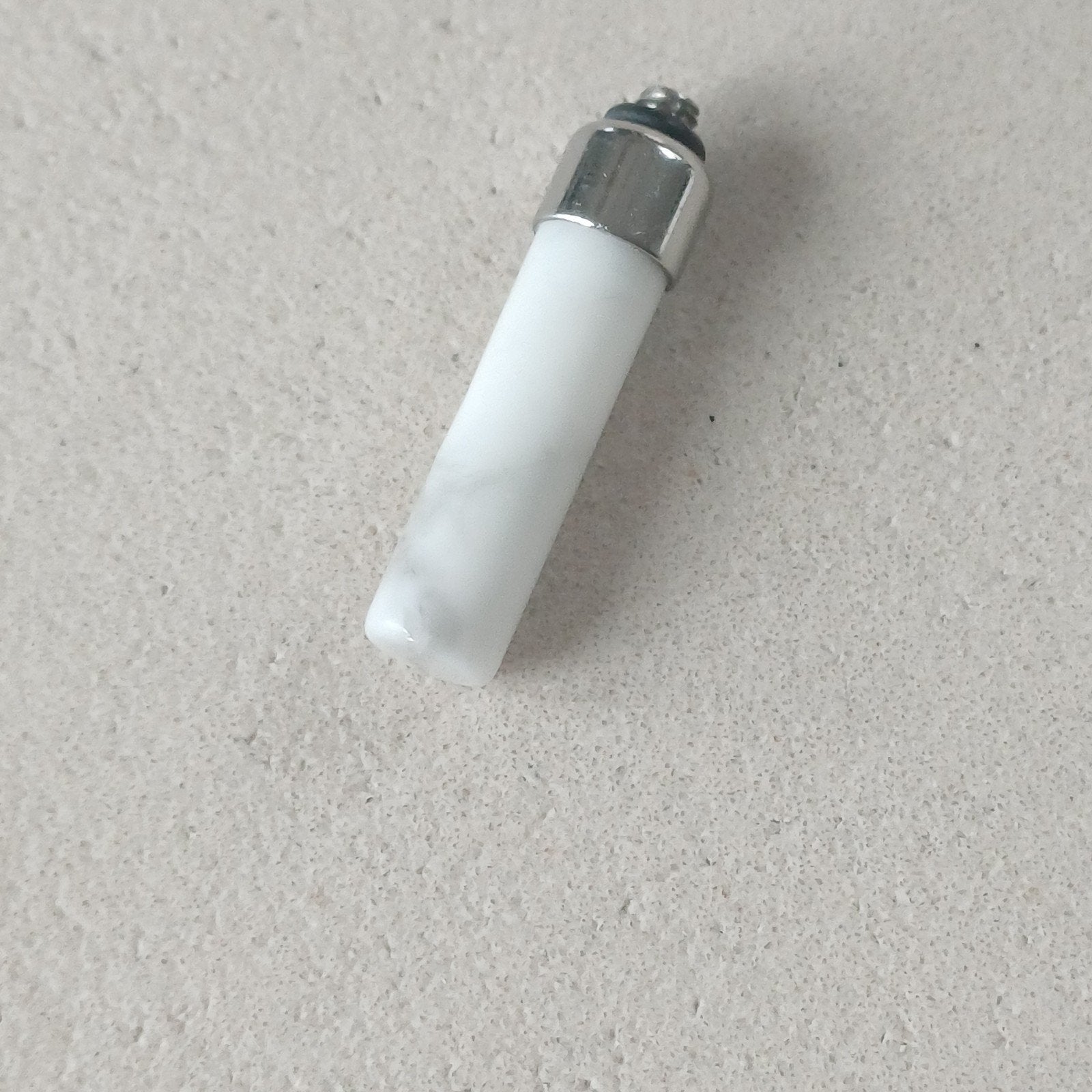 zilverkleurige Melano twisted howlite, Verzenden