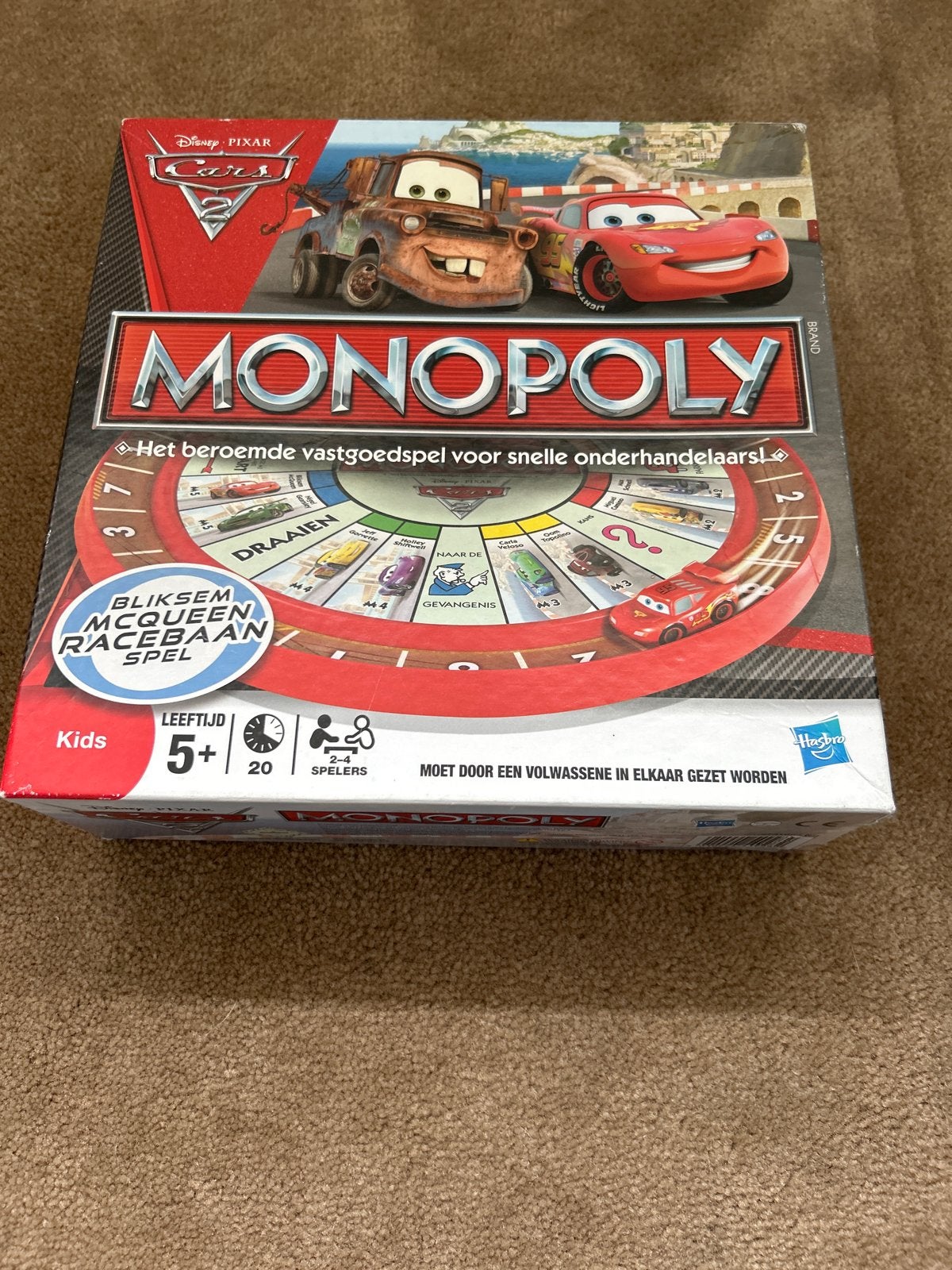 Monopoly Cars 2 Bliksem McQueen Racebaan Spel, Hobby en Vrije tijd, Gezelschapsspellen | Bordspellen, Drie of vier spelers, Ophalen of Verzenden