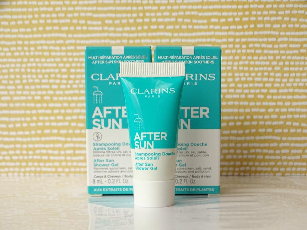 Clarins After Sun Shower Gel Body/Hair 16ml (2 proefjes), Ophalen of Verzenden, Nieuw, Bad & Douche