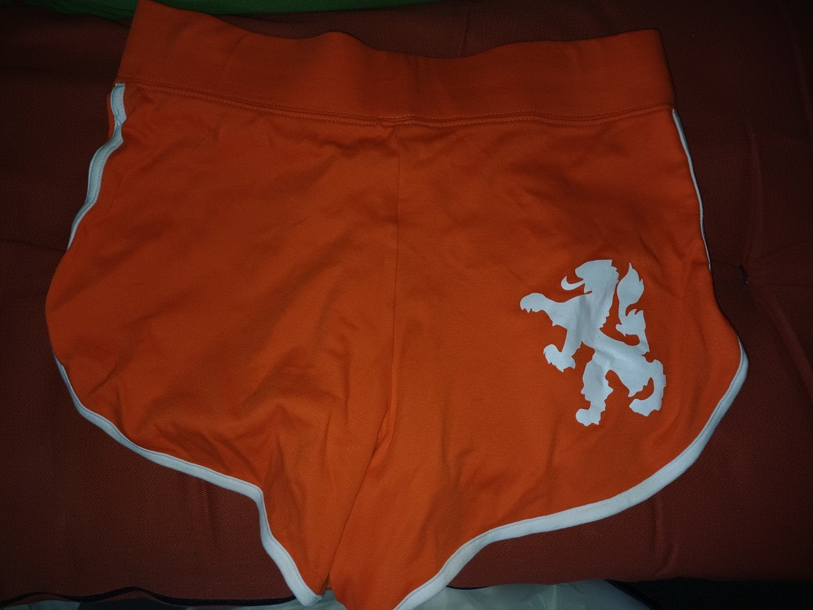 Oranje voetbalbroekje S/M, Hobby en Vrije tijd, Ophalen of Verzenden, Nieuw