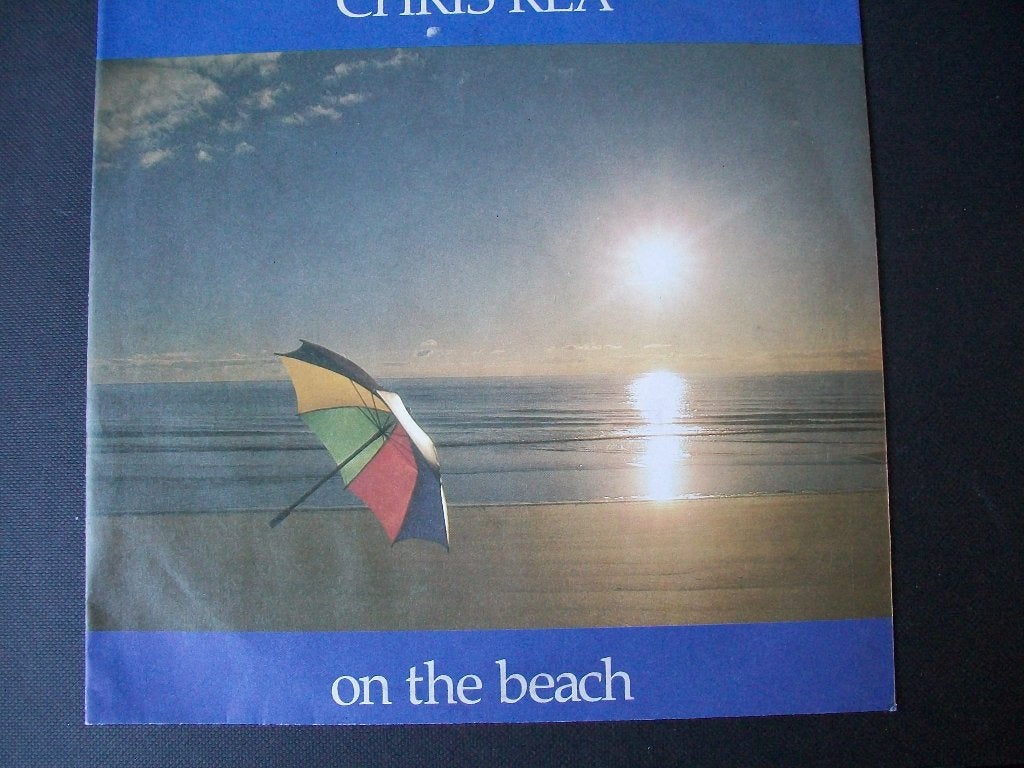 Chris Rea met On The Beach (1986) in nieuwstaat, Verzenden, 7 inch, Beschermende buitenhoes, Zo goed als nieuw