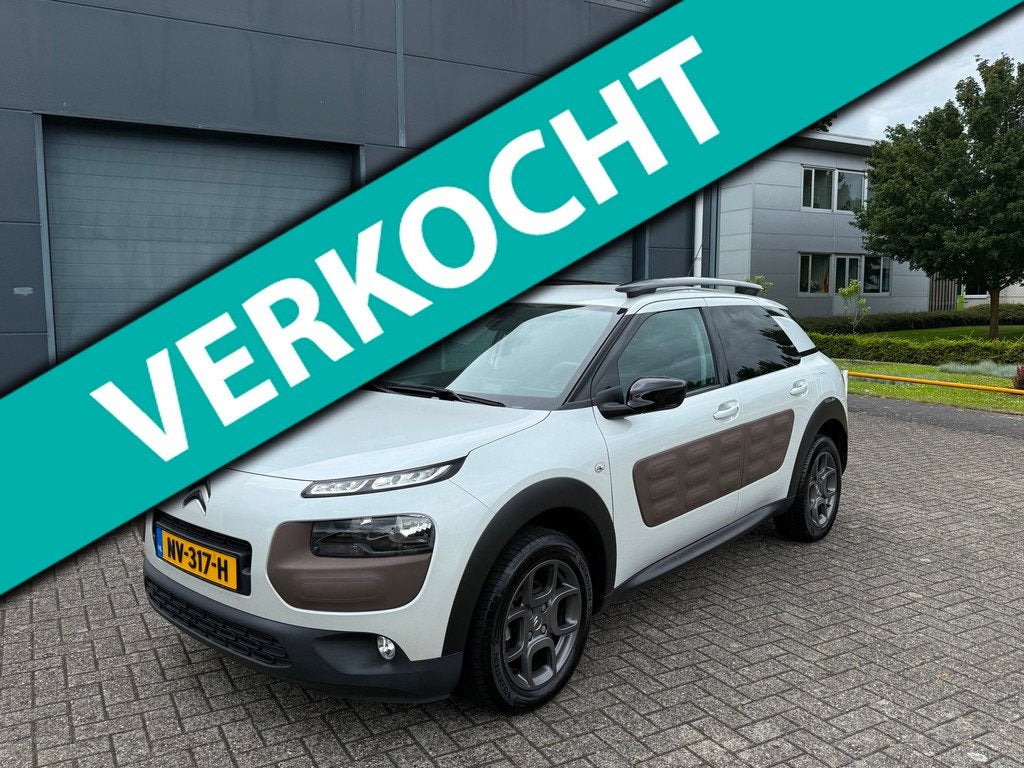 Citroen C4 Cactus 1.2 PureTech Shine Dealer onderhouden APK, Auto's, Voorwielaandrijving, 1199 cc, 82 pk, Wit