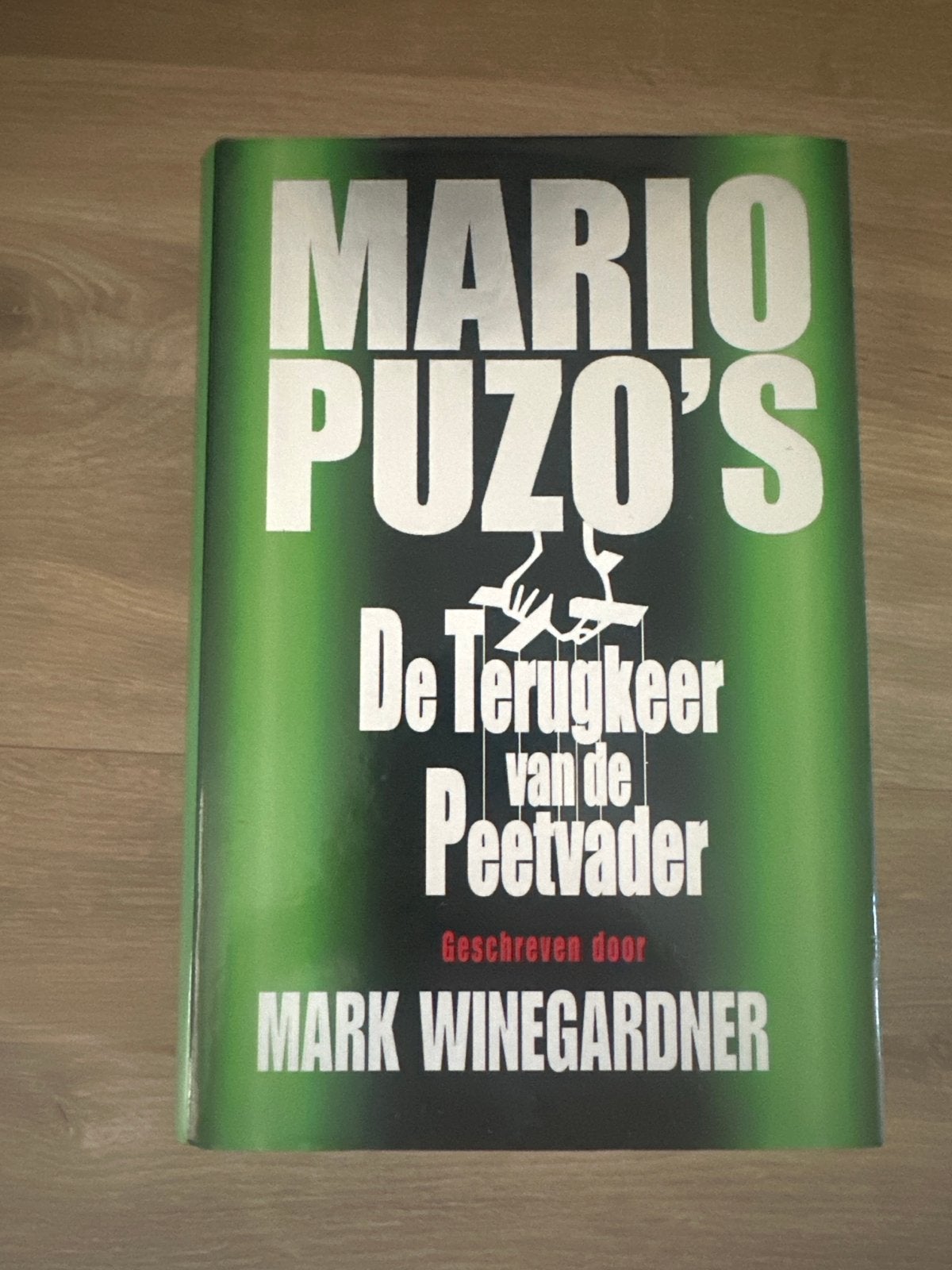 Mario Puzo's De Terugkeer van de Peetvader - Mark Winegardne, Boeken, Ophalen of Verzenden, Gelezen, Nederland