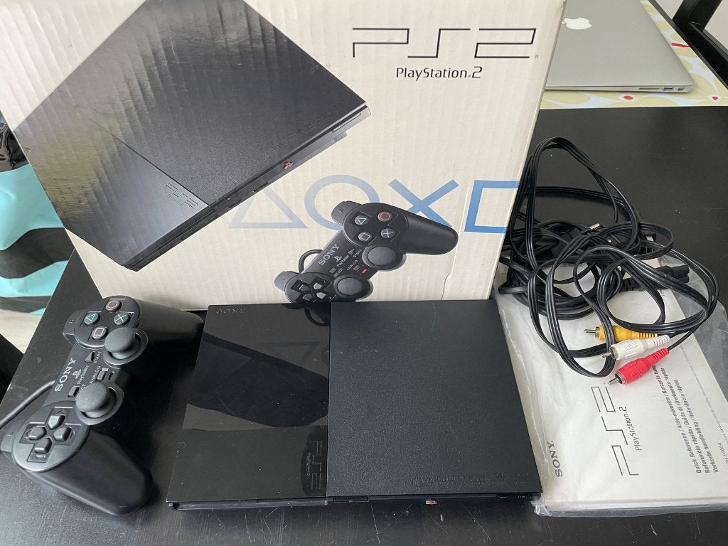 PlayStation 2, Spelcomputers en Games, Spelcomputers | Sony PlayStation 2, Zo goed als nieuw, Slim, Zwart, Met 1 controller, Ophalen of Verzenden