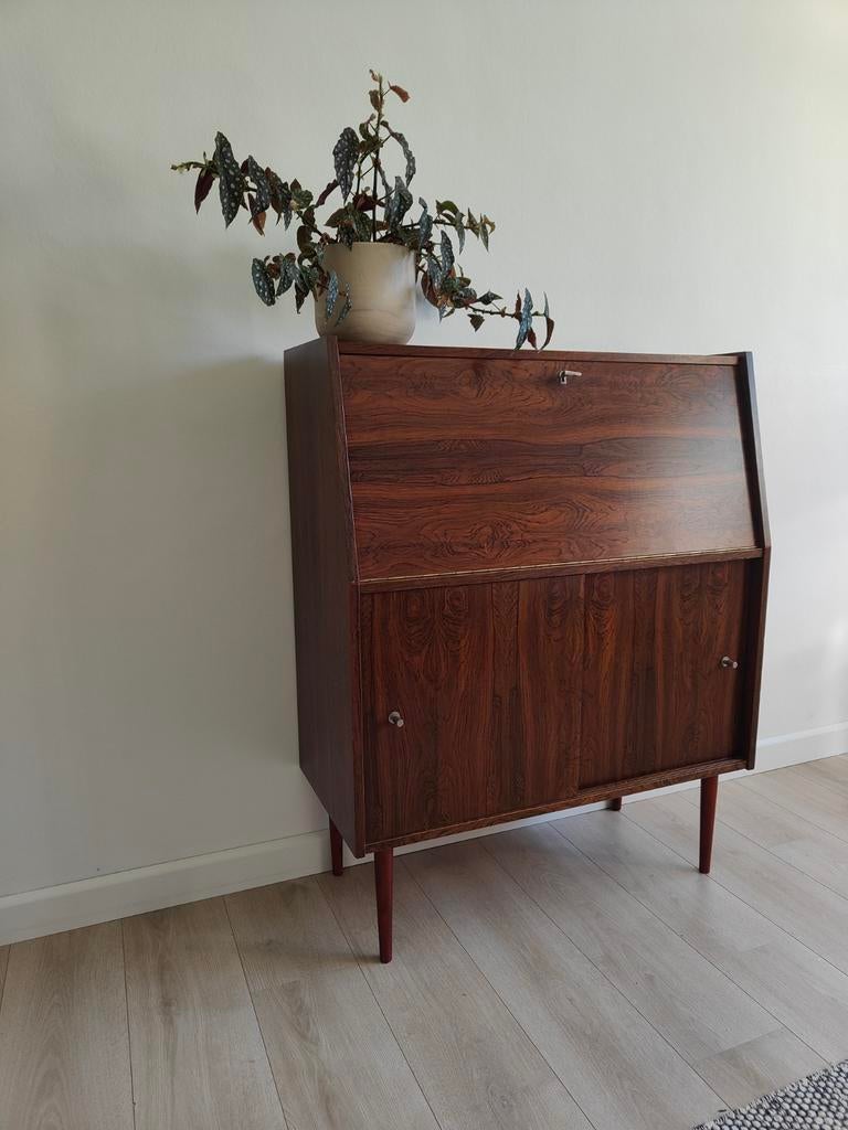 Vintage secretaris, Ophalen