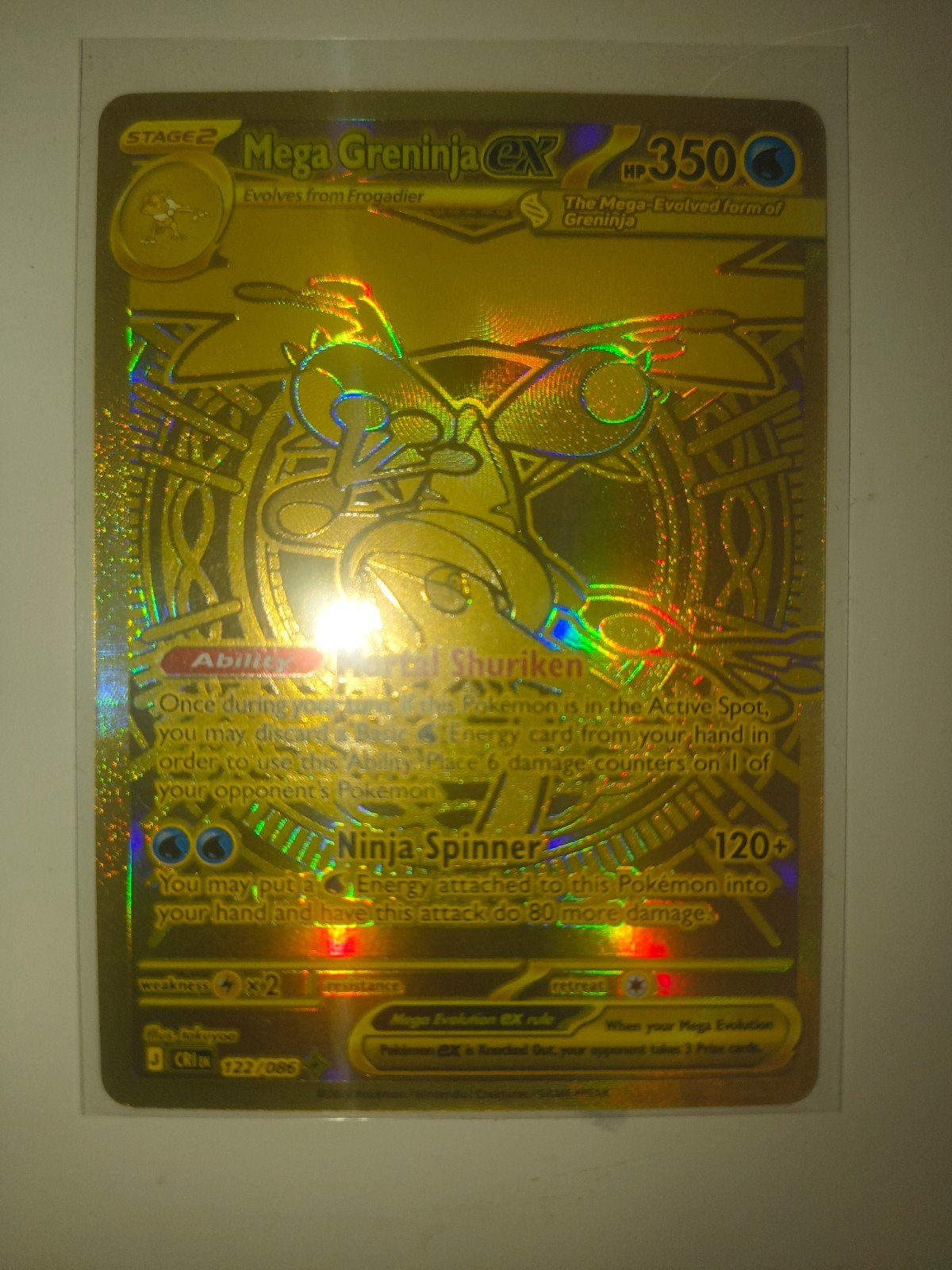 Mega Greninja EX Gouden Pokémon Kaart - Bijna Nieuwstaat, Hobby en Vrije tijd, Ophalen of Verzenden, Zo goed als nieuw, Losse kaart