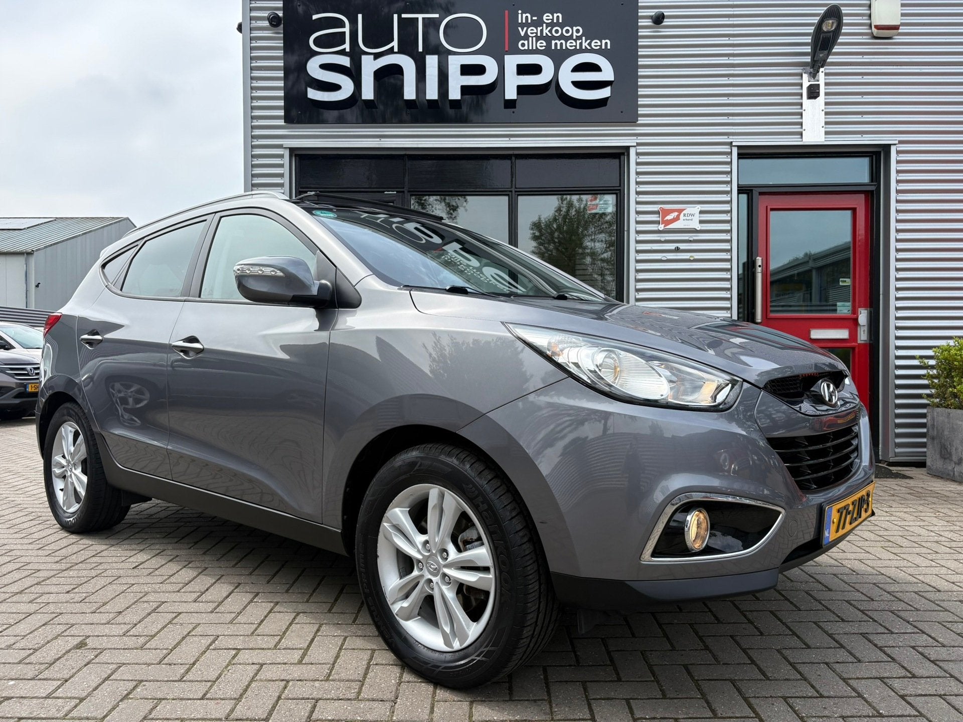Hyundai Ix35 2.0i Business Edition -AUTOMAAT-CLIMA-CRUISE-OP, Gebruikt, Zwart, 4 cilinders, Leder en Stof