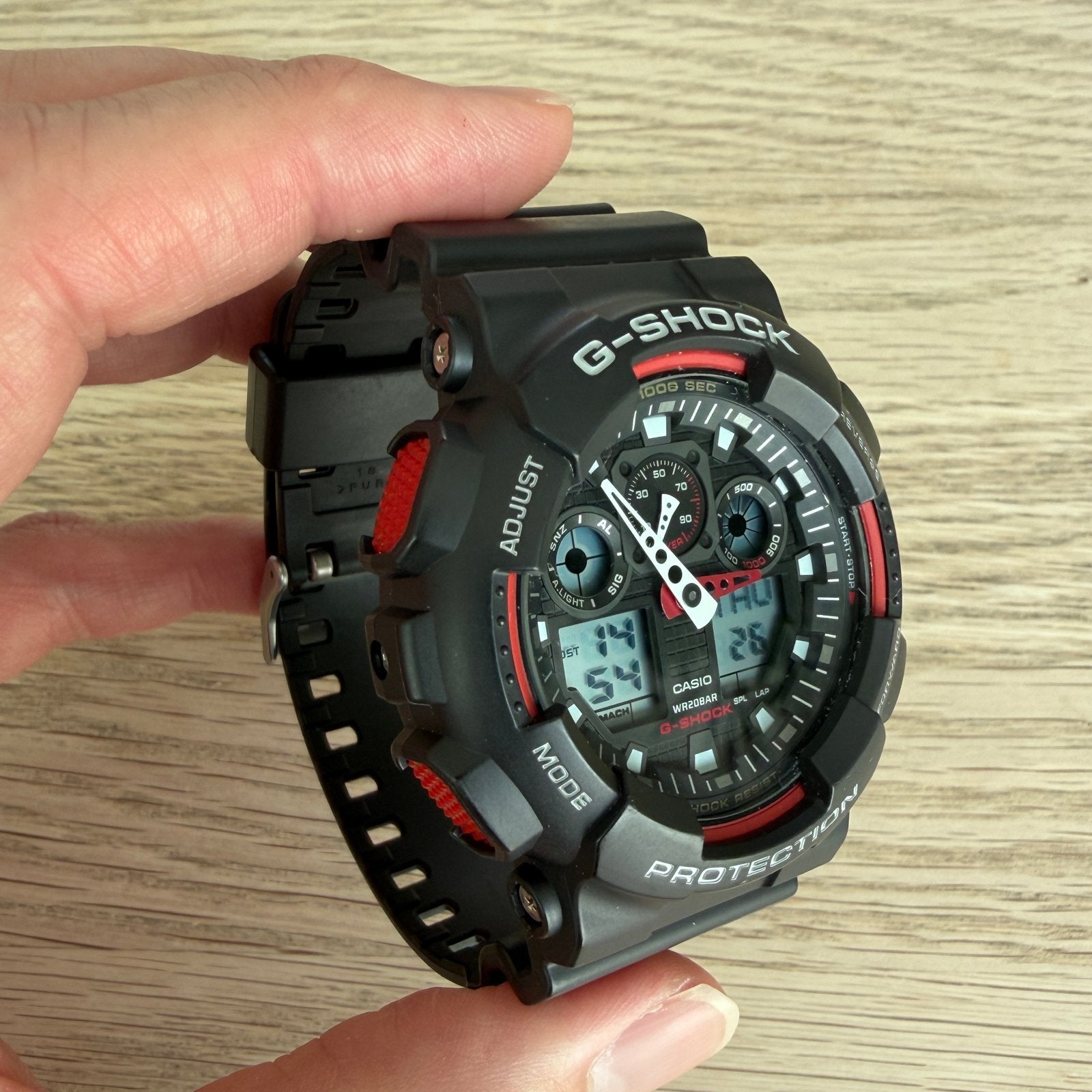 Casio G-SHOCK GA-100-1A4, Sieraden, Tassen en Uiterlijk, Horloges | Heren, Casio, Kunststof, Gebruikt, Polshorloge