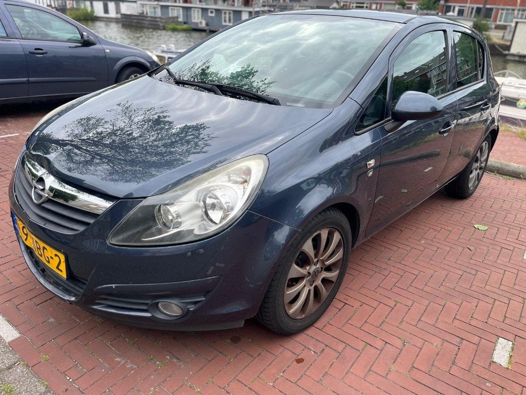 Opel Corsa 1.2 16V 5D Easytronic 2010 Blauw AUTOMAAT, Stof, 4 cilinders, Blauw, 1229 cc