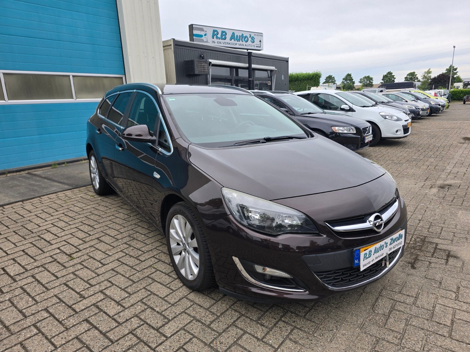 Opel Astra 1.4 Turbo 88KW ST 2012 Bruin, Auto's, Opel, Bedrijf, Astra, ABS, Airbags, Airconditioning, Alarm, Bluetooth, Boordcomputer
