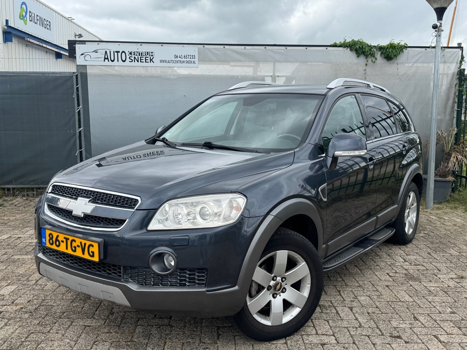 Chevrolet Captiva 2.4i 4x4 - 7 PERS - Clima - Cruise - PDC -, Auto's, Chevrolet, 136 pk, Gebruikt, Zwart, 4 cilinders