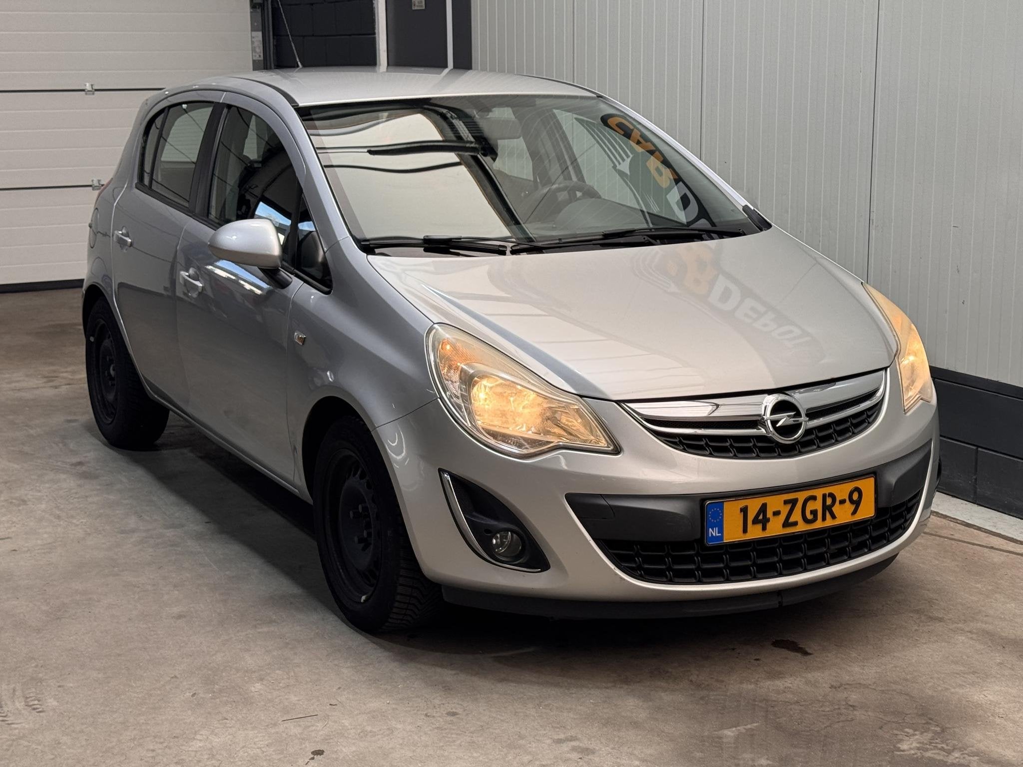 Opel Corsa 1.2-16V Cosmo, Auto's, Opel, Voorwielaandrijving, Euro 5, Gebruikt, 4 cilinders