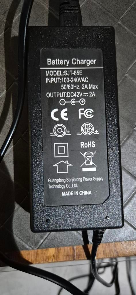Batterijlader SJT-85E DC42V 2A, Ophalen of Verzenden