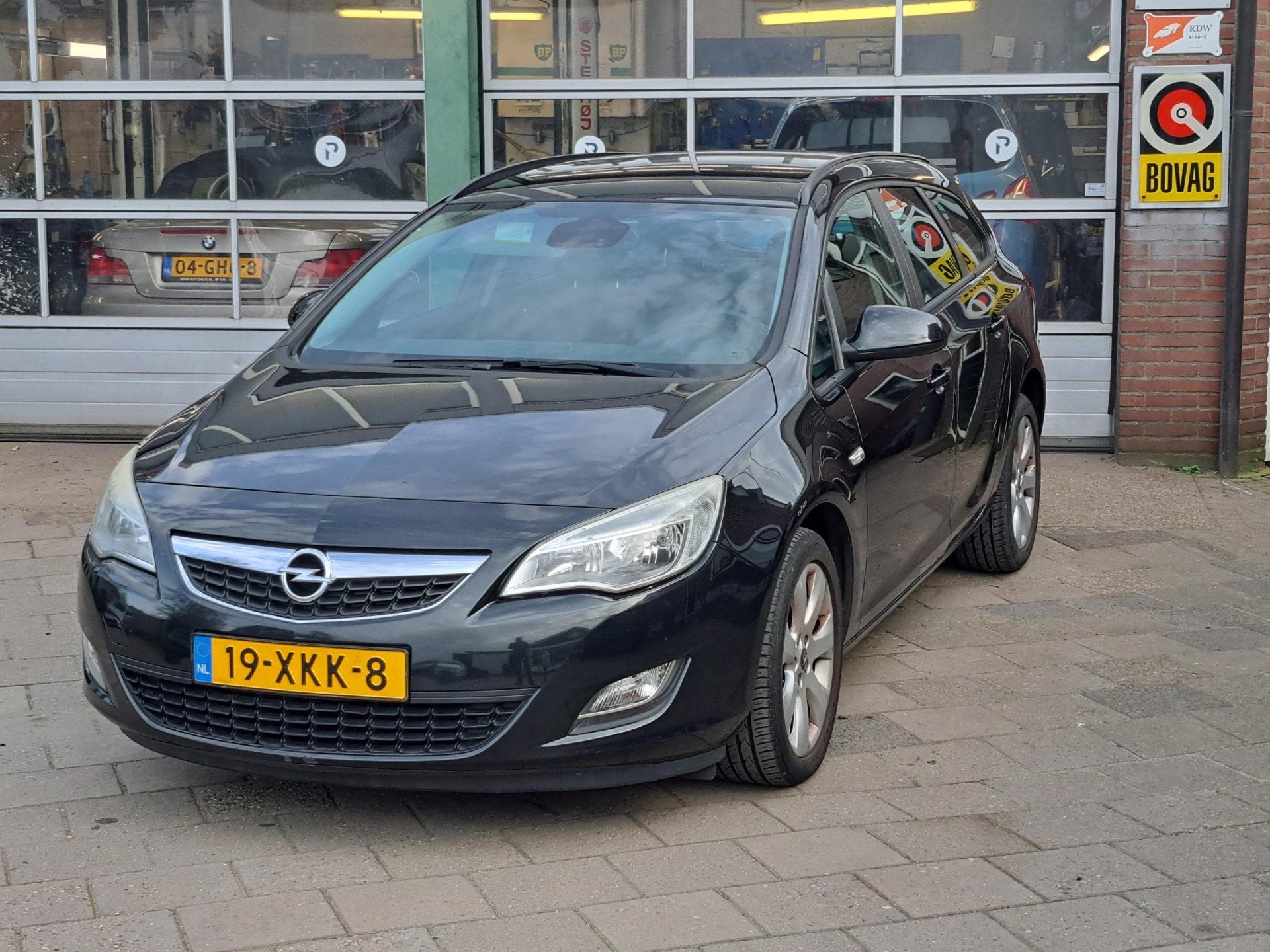 Opel Astra Sports Tourer 1.4 Turbo Edition (bj 2012), Auto's, Euro 5, Stof, Gebruikt, Zwart