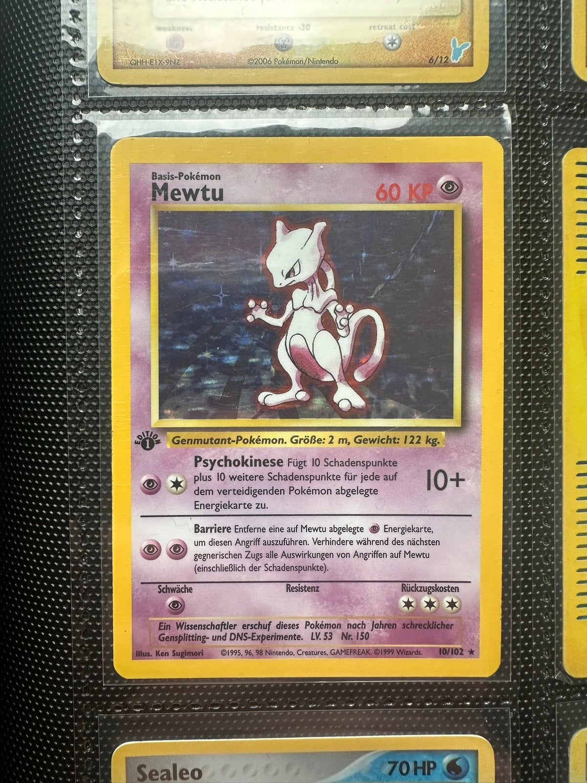 Mewtwo holo first edition base set, Ophalen of Verzenden, Zo goed als nieuw