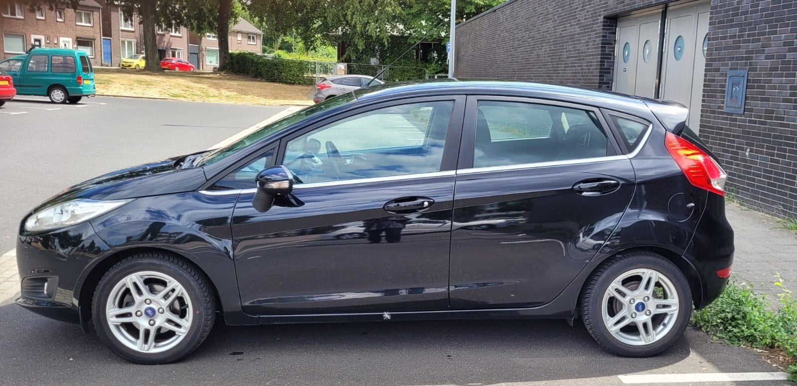Ford Fiësta 1.0 74KW/100PK 5D 2014 Zwart, Auto's, Voorwielaandrijving, 100 pk, Handgeschakeld, Particulier
