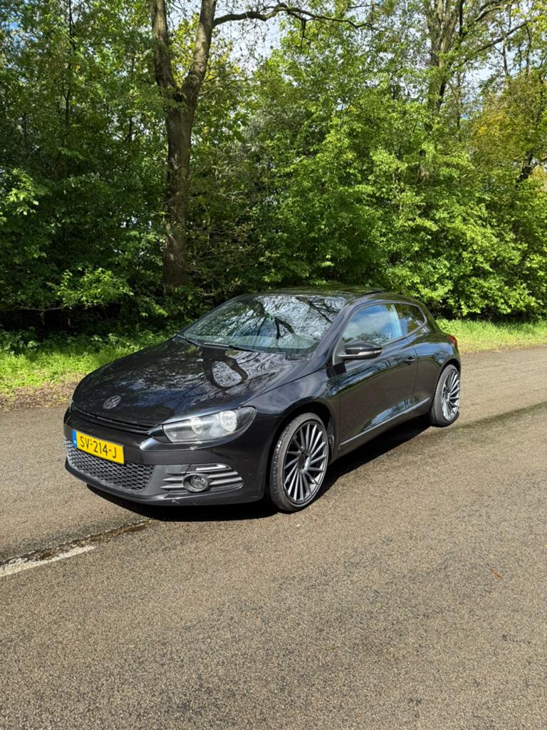 Volkswagen Scirocco 2.0 TSI DSG 2008 Zwart, Auto's, Zwart, 4 cilinders, 1984 cc, 4 stoelen