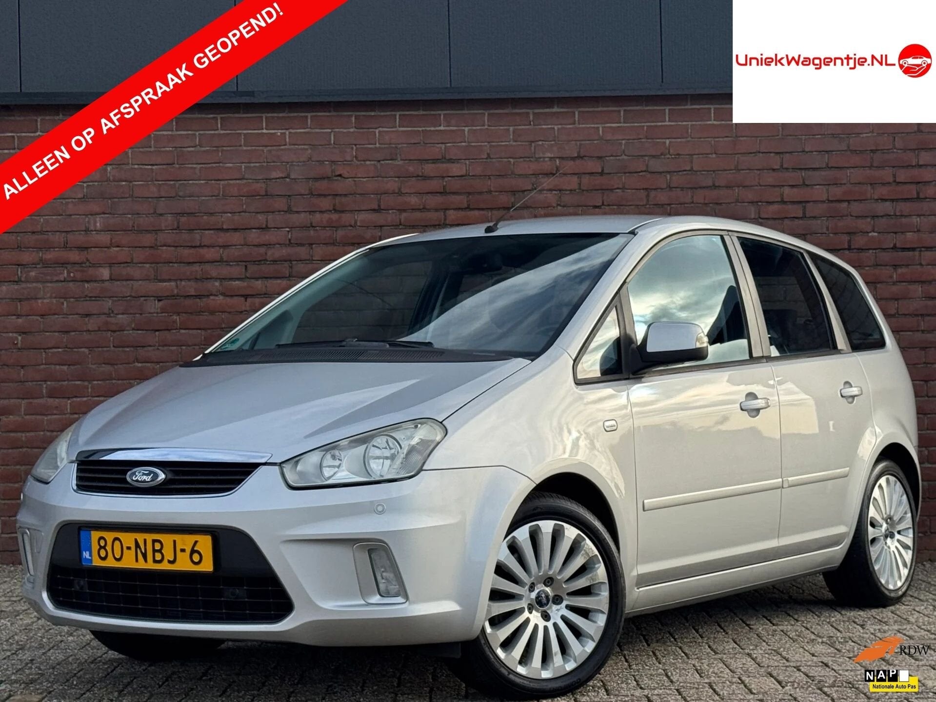 Ford C-MAX 2.0-16V LIMITED | NL-AUTO! | NAVI! | CRUISE!, Stof, Gebruikt, Zwart, 4 cilinders