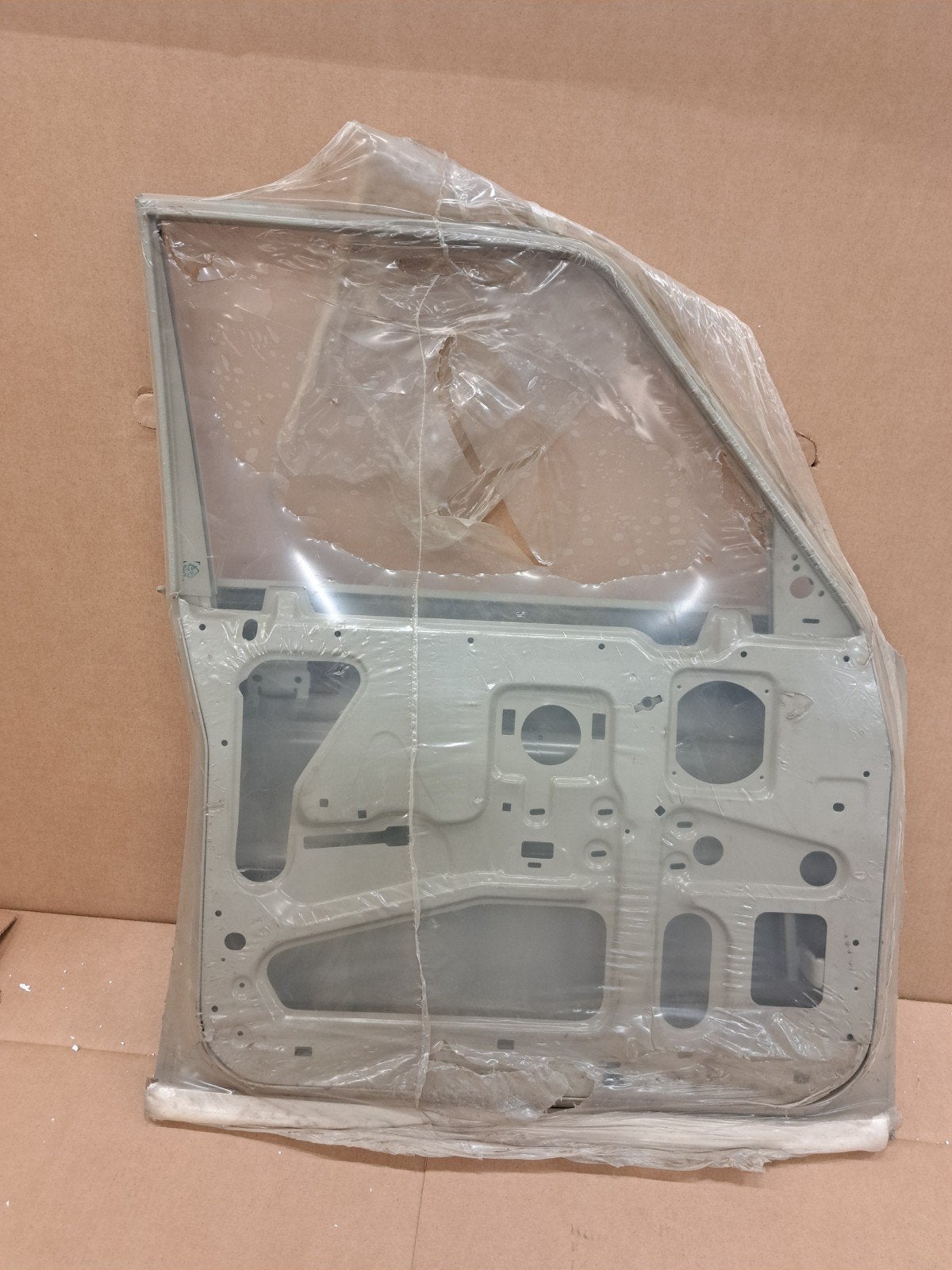 Volvo 1315683-1 Voordeur links - Nieuw, Auto-onderdelen, Deur, Voor, Nieuw, Ophalen of Verzenden