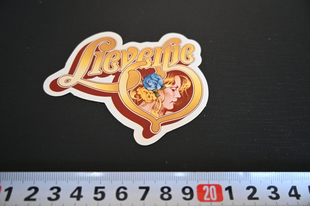 sticker logo LIEVERTJE vrouw roos geel blauw, Ophalen of Verzenden, Zo goed als nieuw