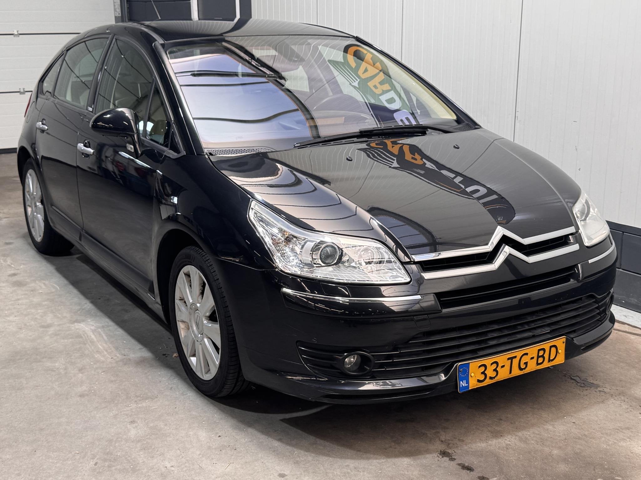 Citroen C4 2.0-16V Exclusive, Gebruikt, Zwart, Origineel Nederlands, Handgeschakeld