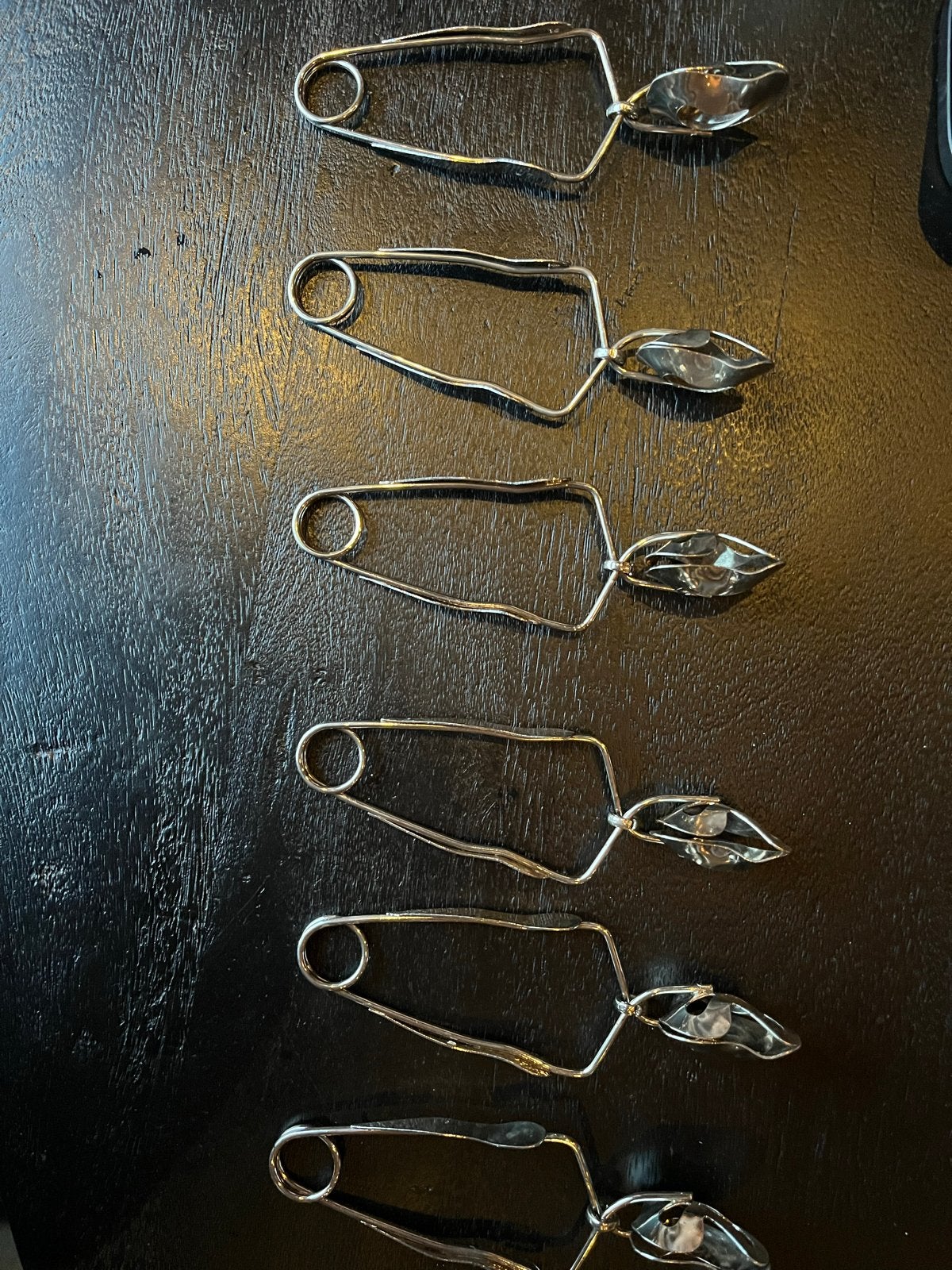 Set van 6 slakken knijpers - Zo goed als nieuw!, Huis en Inrichting, Ophalen of Verzenden, Zo goed als nieuw, Rvs of Chroom, Los bestek