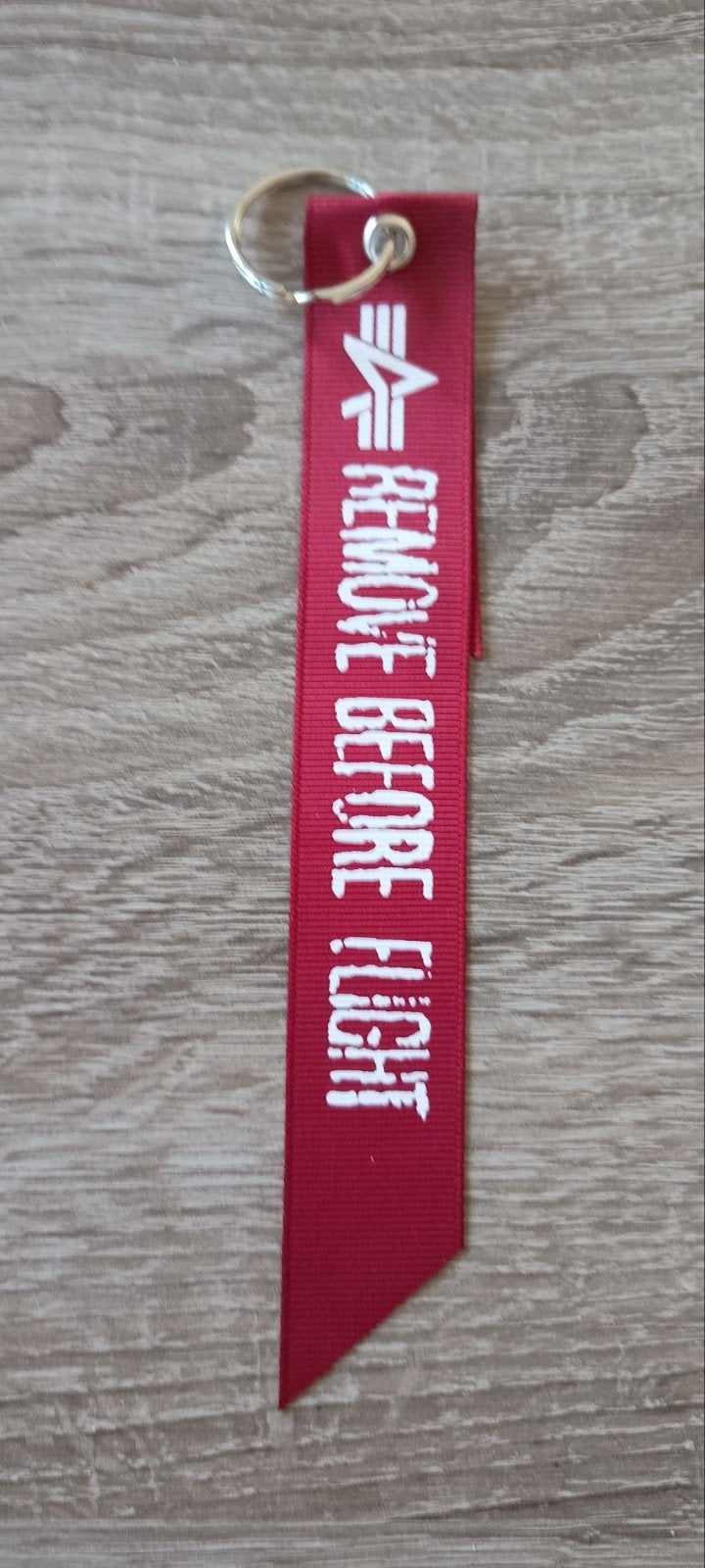 Alpha Industries Remove Before Flight Sleutelhanger, Verzamelen, Ophalen of Verzenden, Nieuw, Overige typen