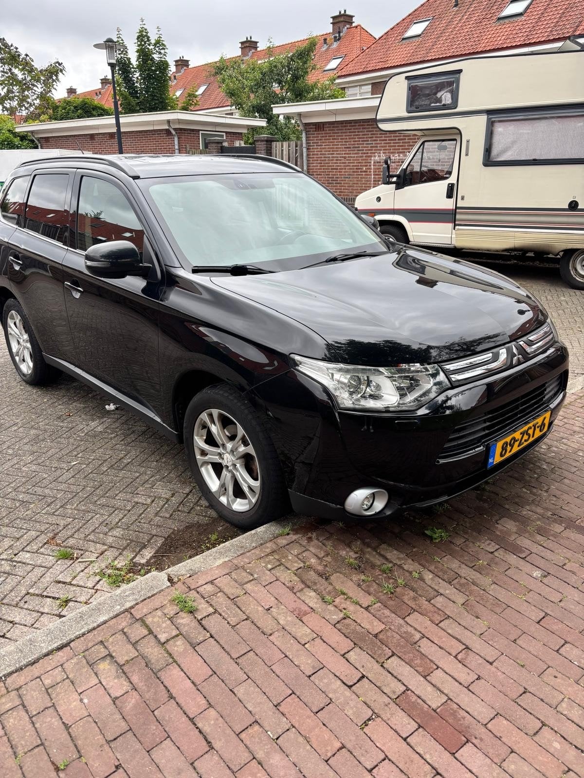 Mitsubishi Outlander 7 persoons zwart, Auto's, Automaat, 1998 cc, 15 km/l, Outlander