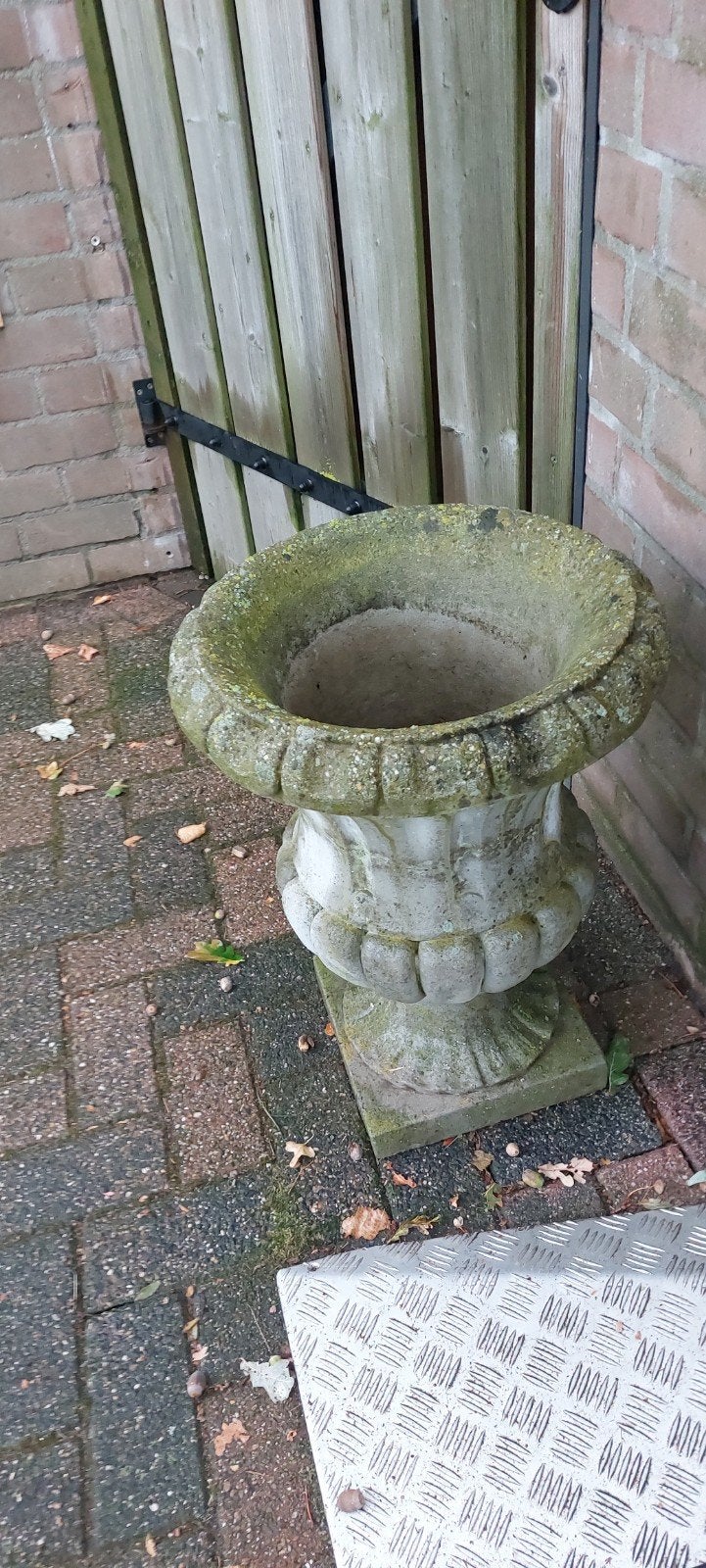 steen  bloempot, Ophalen