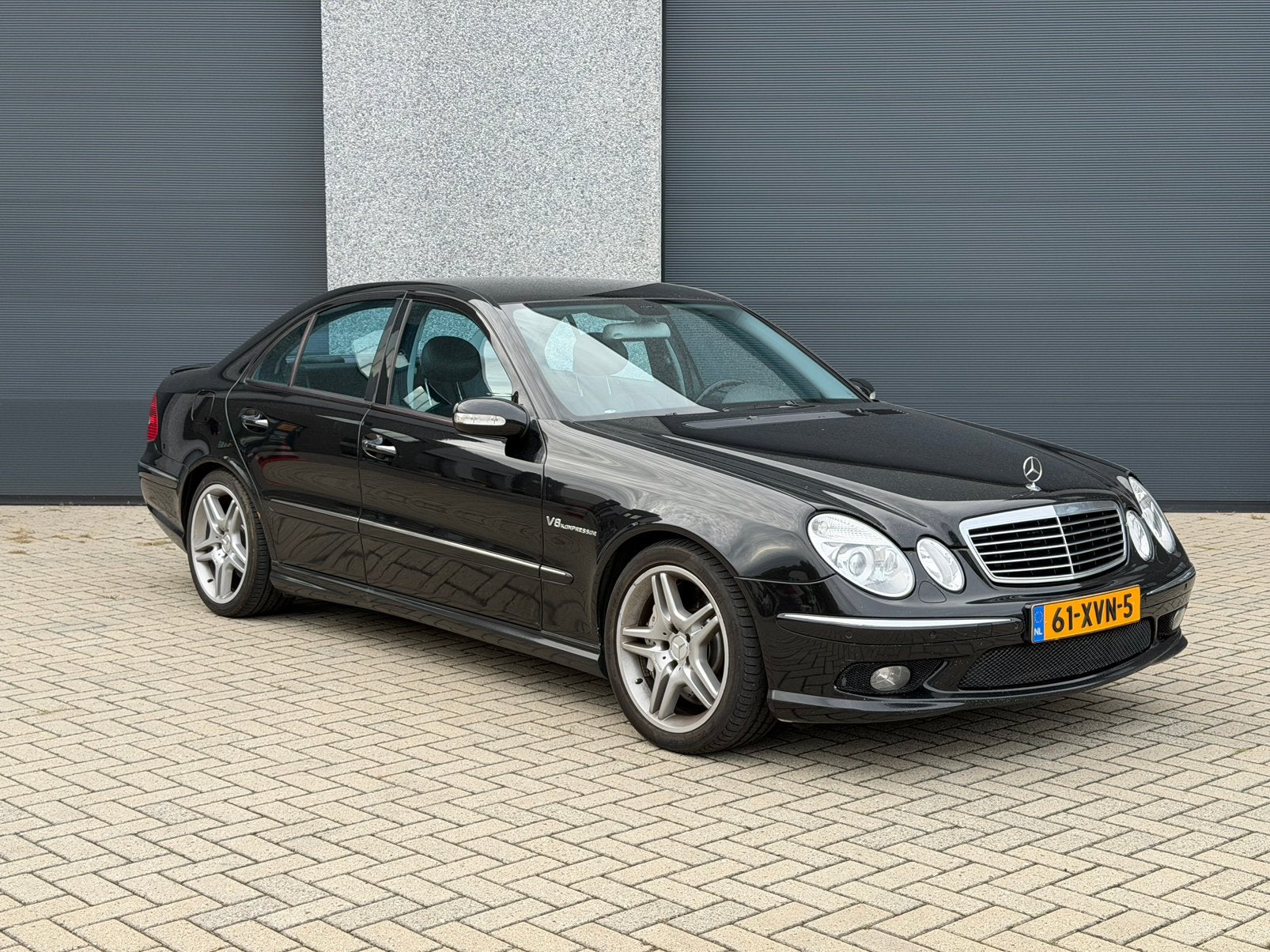 Mercedes-Benz E-Klasse 5.4 E55 AMG Sedan AUT 2003 Zwart, Auto's, Mercedes-Benz, Automaat, Achterwielaandrijving, Zwart, Particulier