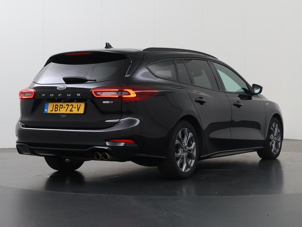 Ford Focus Wagon 1.0 EcoBoost Hybrid ST Line X | Winterpakke, Auto's, Stof, Gebruikt, Zwart, 155 pk