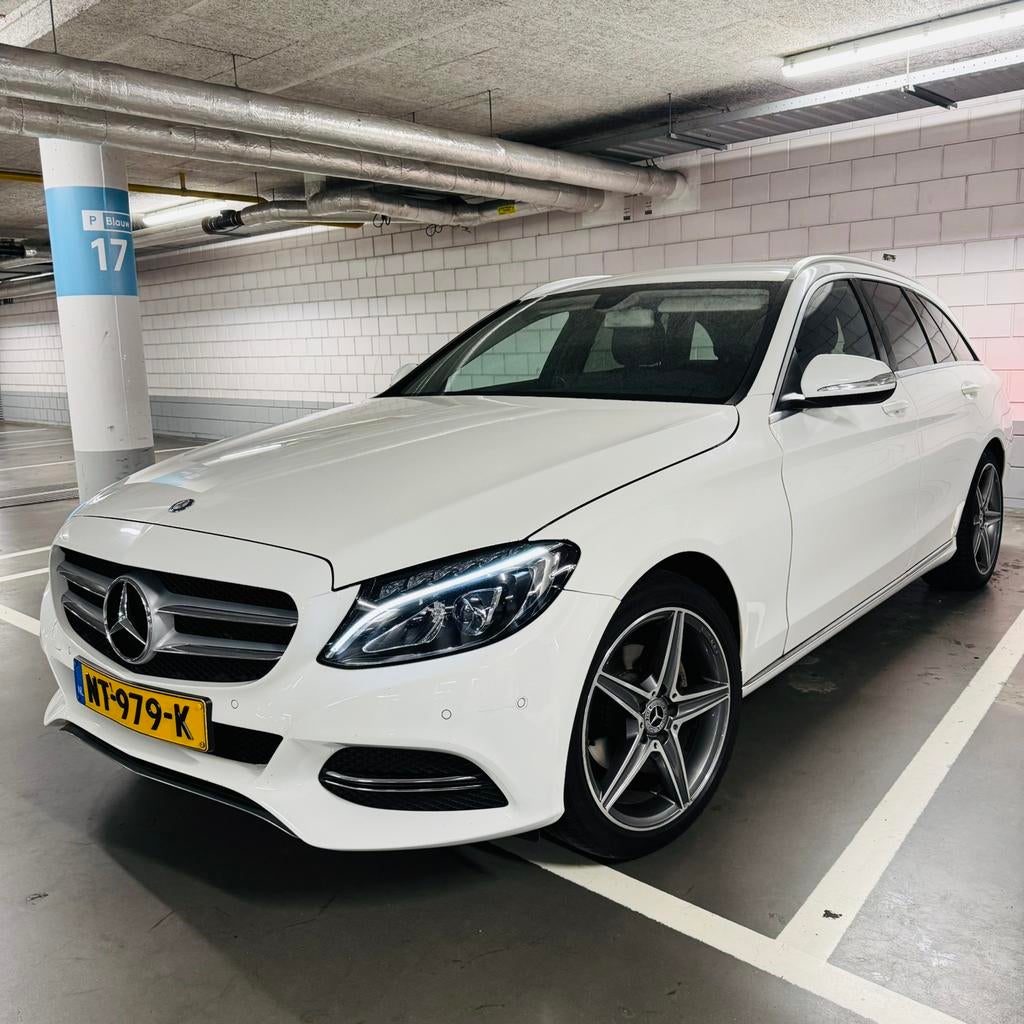 Mercedes-Benz C-Klasse C180 1.6 115KW Aut7 Estate 2015 Wit, Automaat, 745 kg, Achterwielaandrijving, 1800 kg
