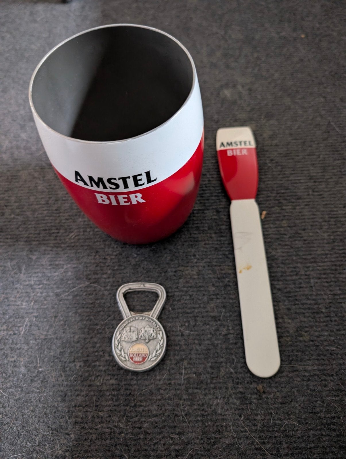 AMSTEL BIER AFSCHUIMHOUDER, Ophalen