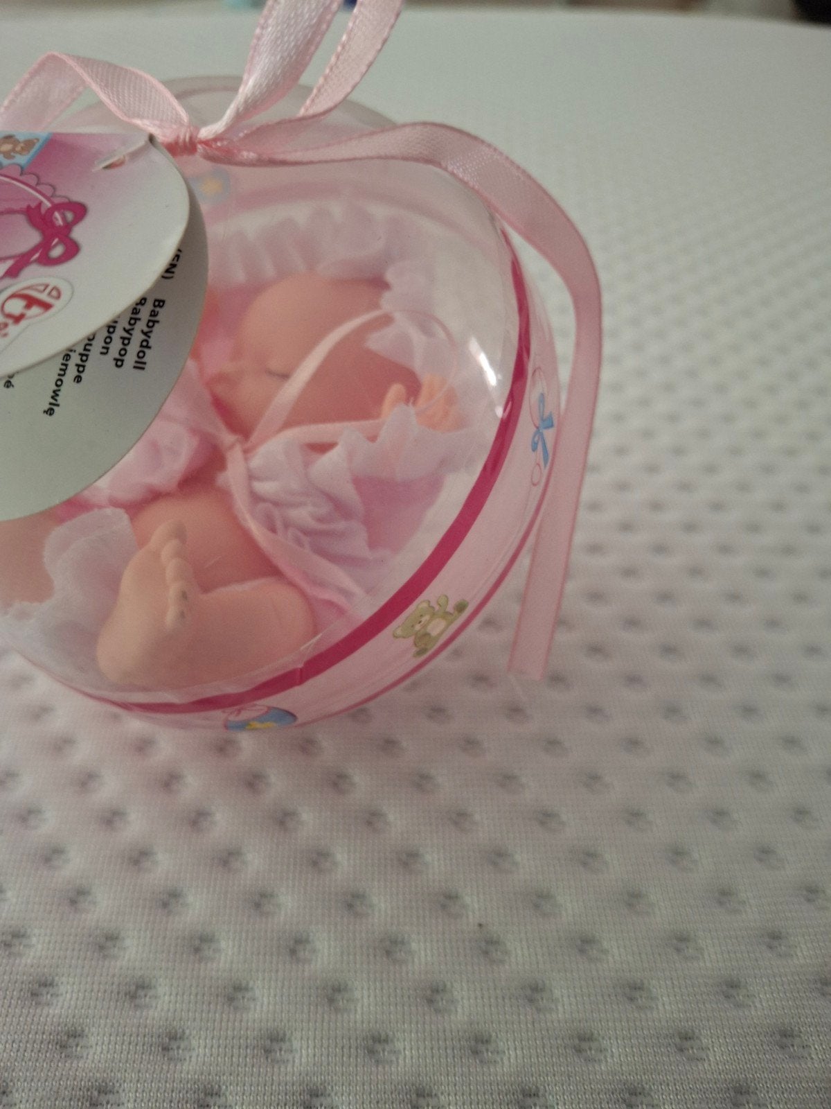 Plastic bol met babypopje., Ophalen, Nieuw, Kraamcadeau