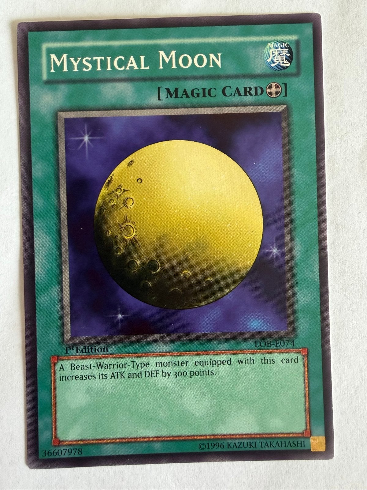 Yu-Gi-Oh! Mystical Moon LOB-E074 1st Edition, Ophalen of Verzenden, Gebruikt, Losse kaart