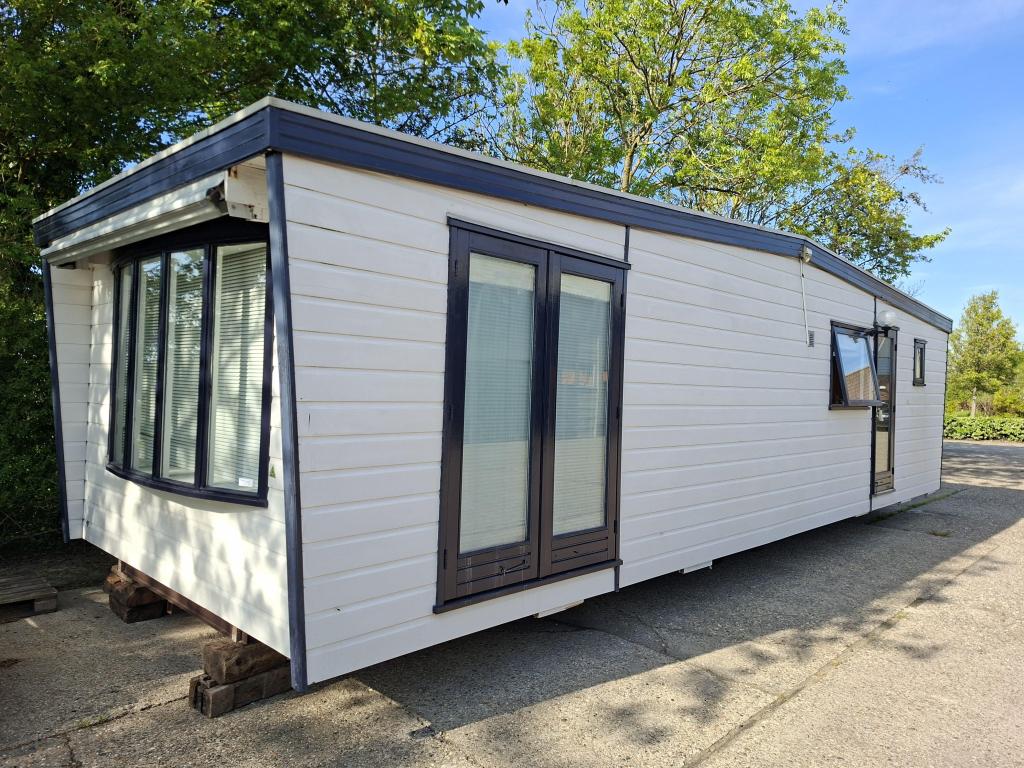 Chalet met dubbelglas en centrale verwarming, Caravans en Kamperen, Stacaravans, Tot en met 4