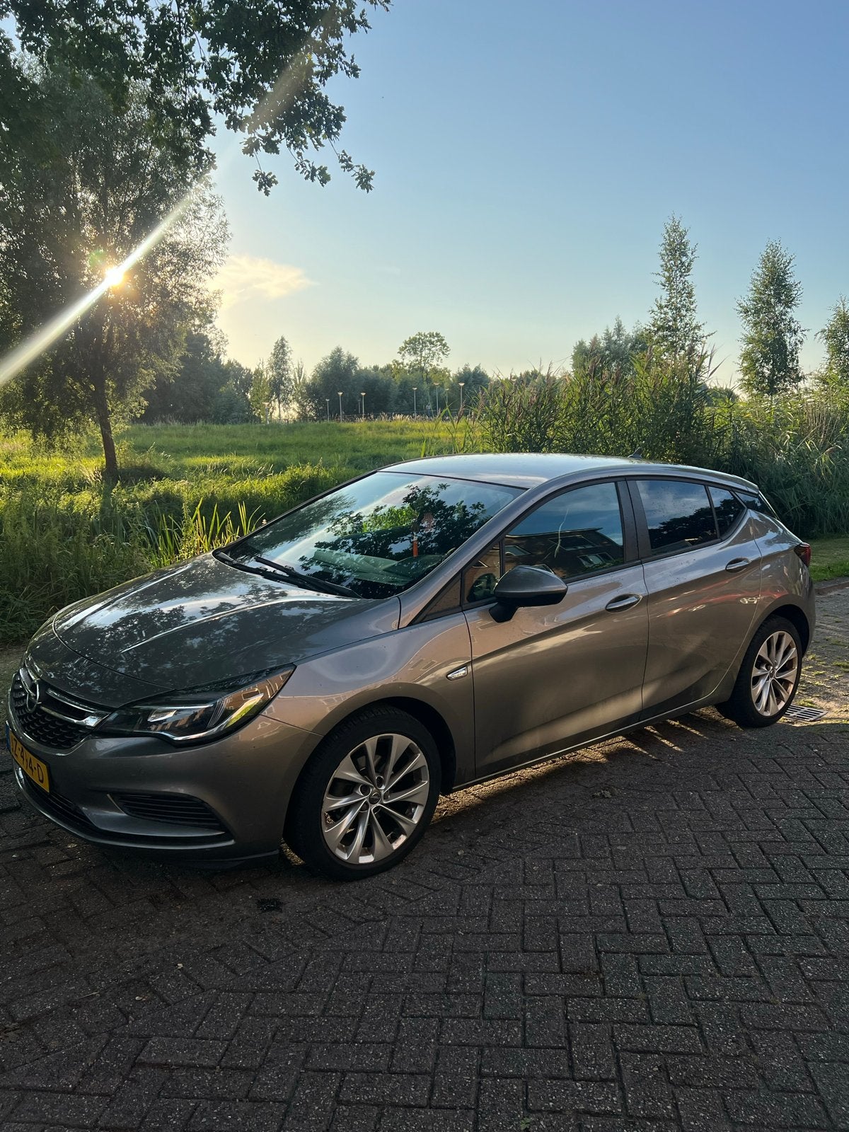 Opel Astra 1.0 Turbo 77KW 5D 2016 Bruin, Bruin, 610 kg, 23 km/l, Origineel Nederlands