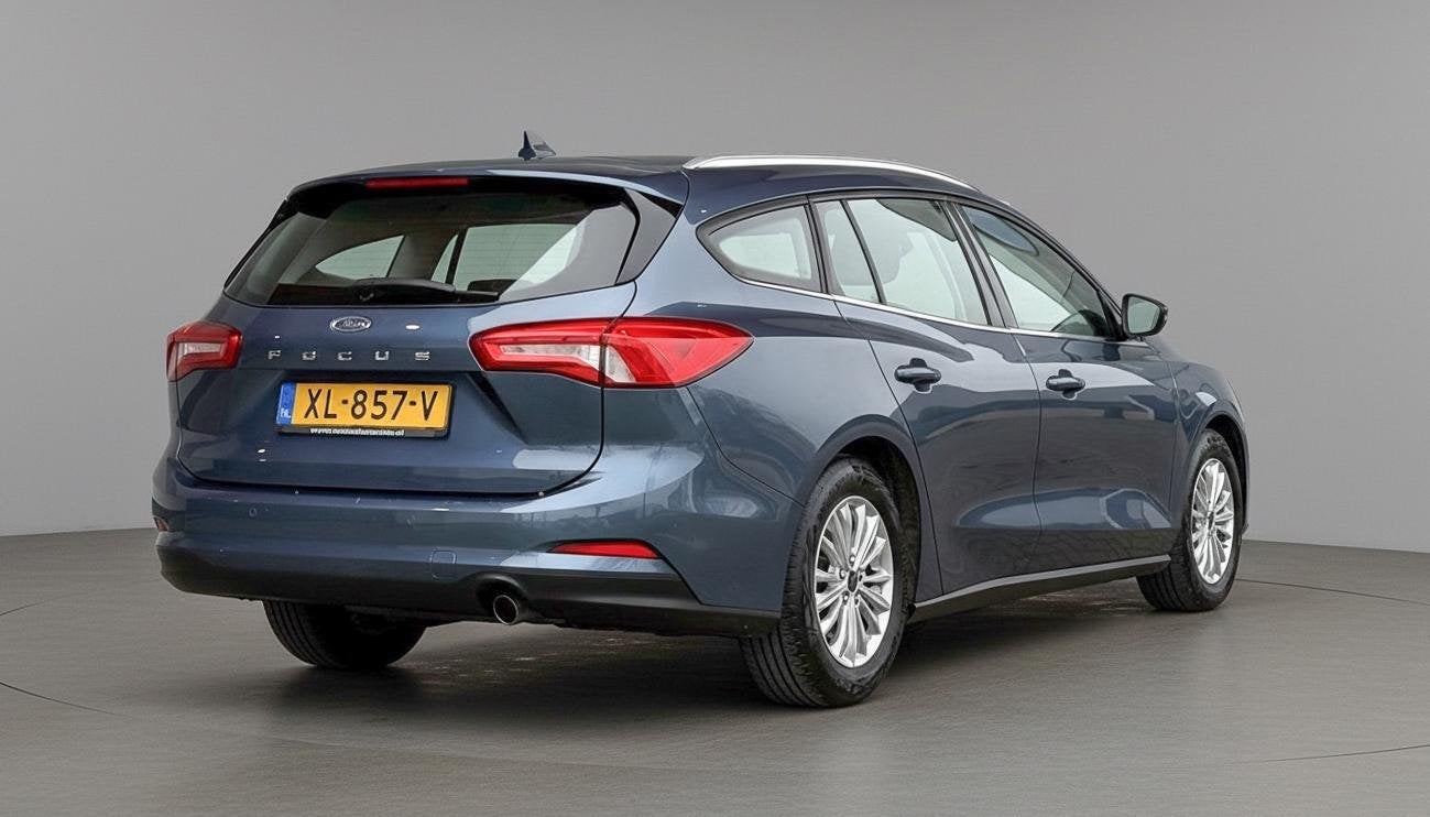 Ford Focus Wagon 1.0 EcoBoost Titanium Business, Auto's, Gebruikt, 715 kg, Blauw, 3 cilinders