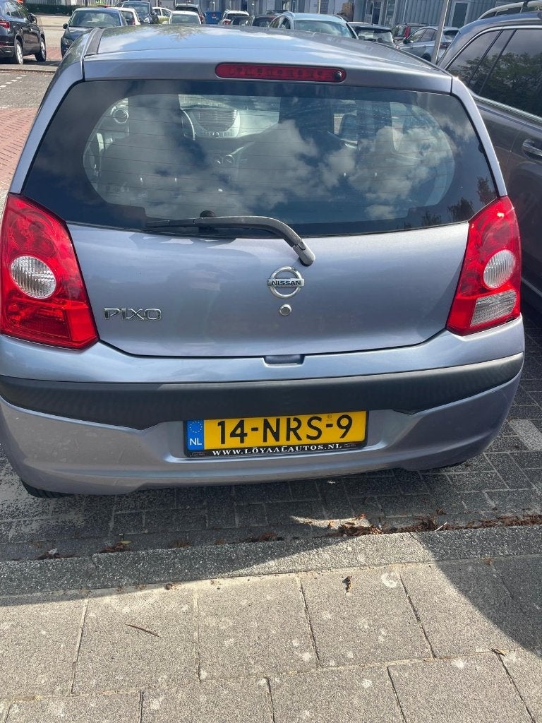 Nissan Pixo 1.0 50KW 5D 2010 Grijs, Auto's, Nissan, Voorwielaandrijving, USB, 200 kg, Origineel Nederlands
