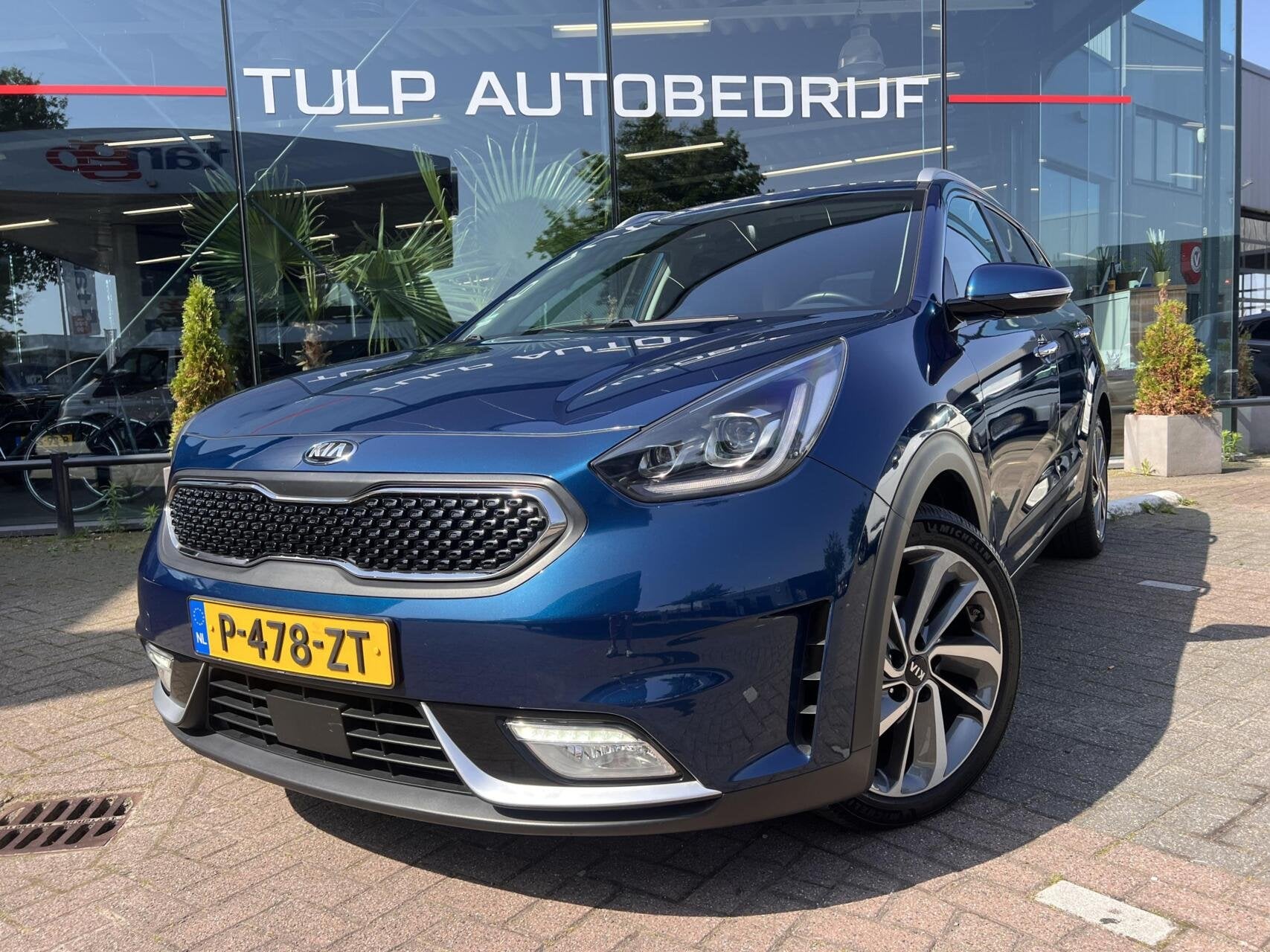 Kia Niro 1.6 GDi Hybrid ExecutiveLine Clima Leder Cruise JBL, Auto's, Dealer onderhouden, Blauw, 23 km/l, Leder